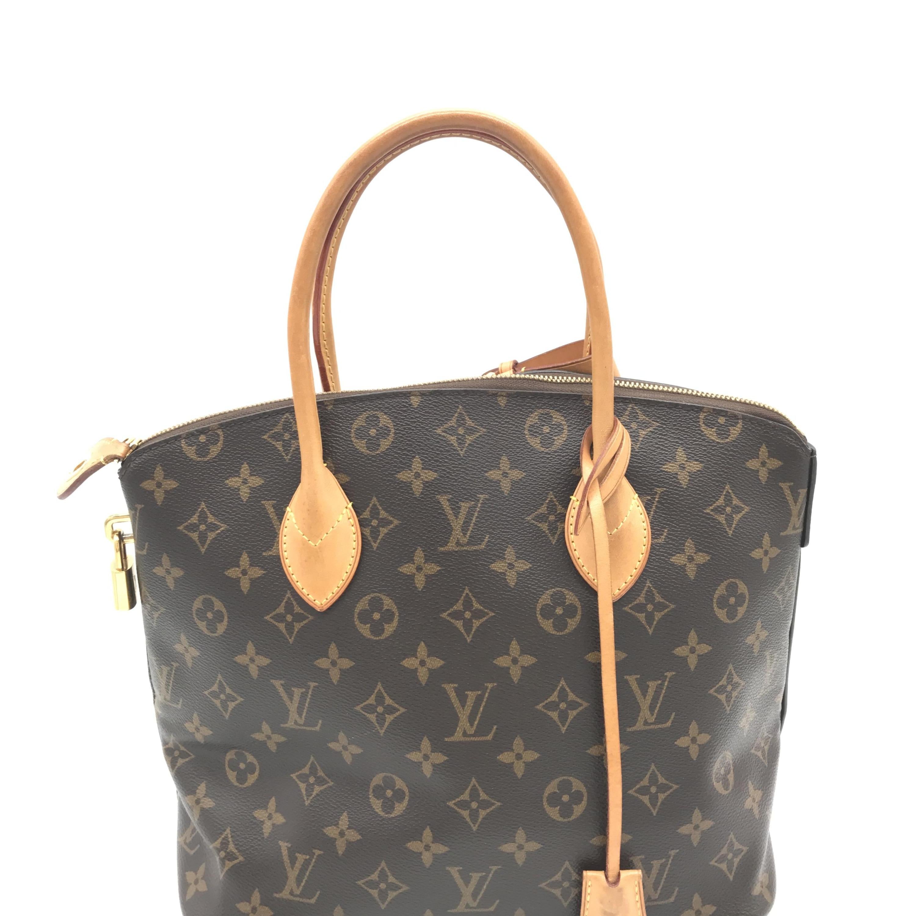 Monogram Lockit PM Canvas Handbag C331592