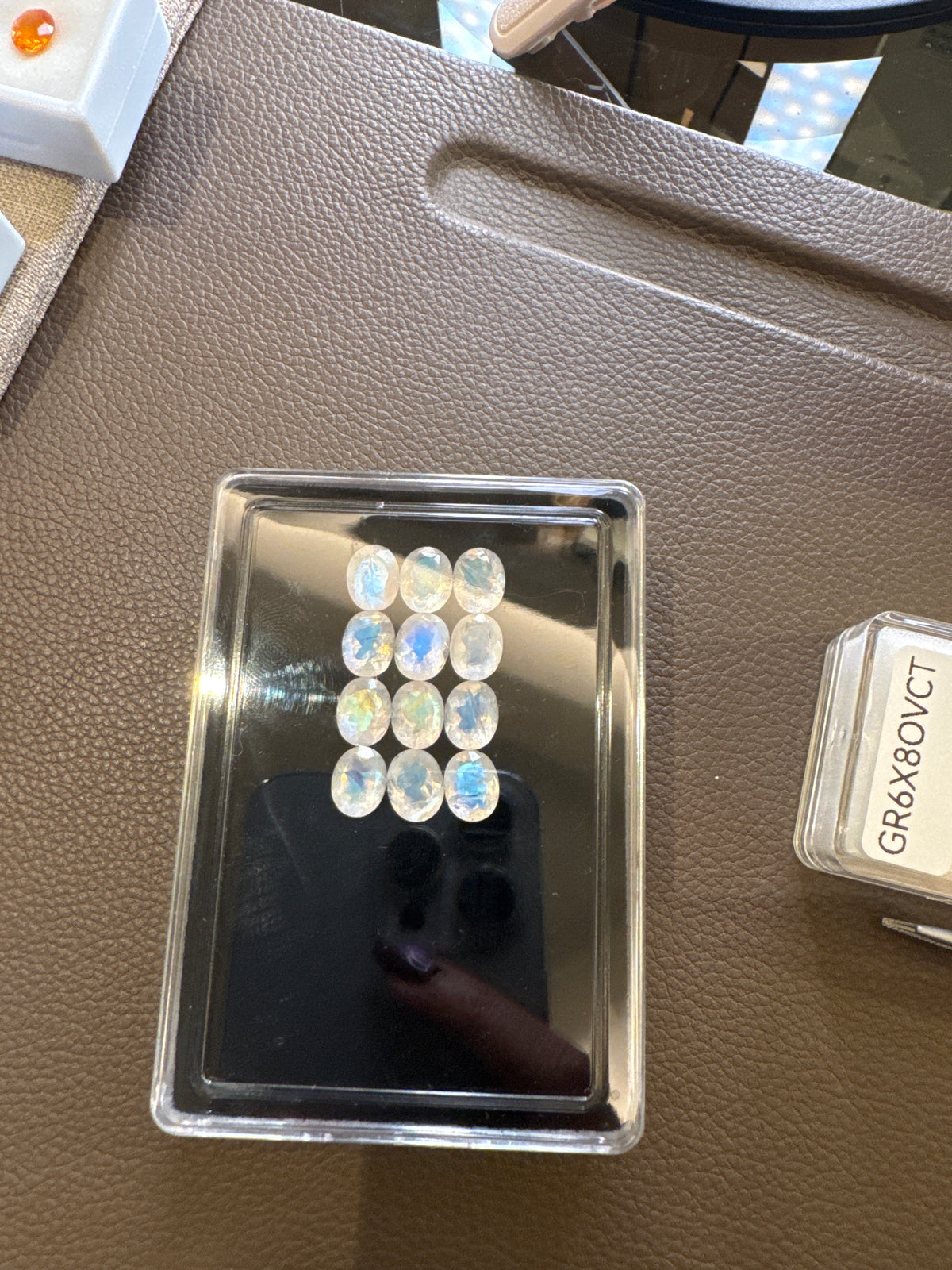 22.01crt Rainbow moonstone 7X9 Oval Facted (12 Pcs Box) RNB7X9OVCT