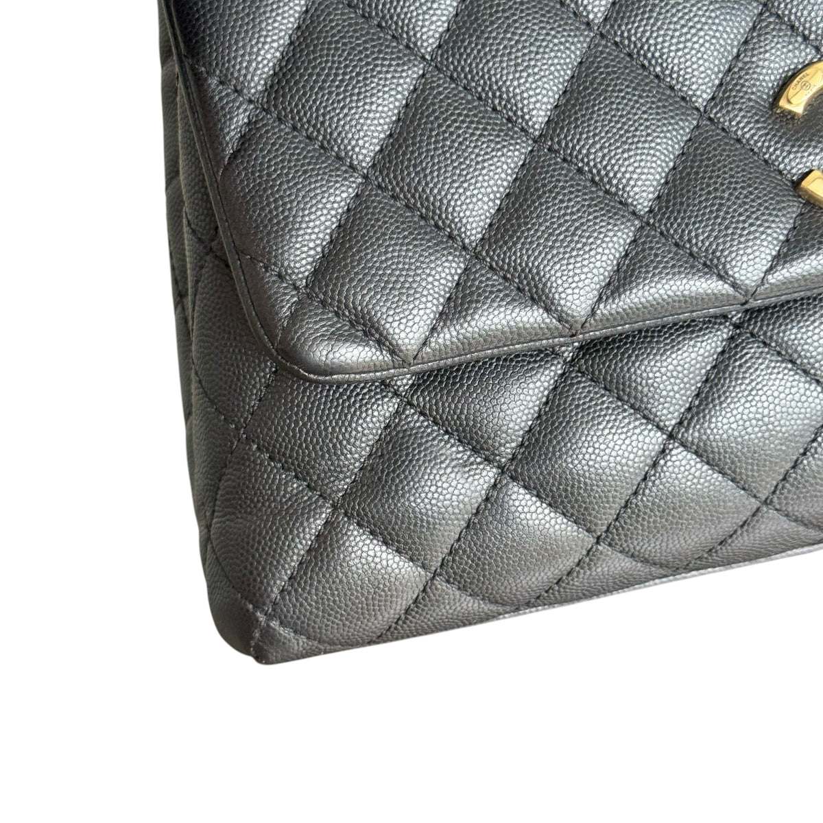 Luxury Evermore Chanel Coco Handle medium handbag in black quilted caviar leather with gold hardware detail