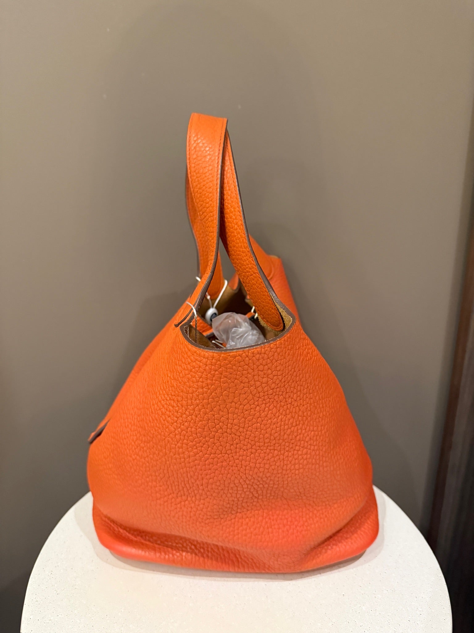 Hermès Picotin Lock 22 in orange Clemence leather with palladium hardware