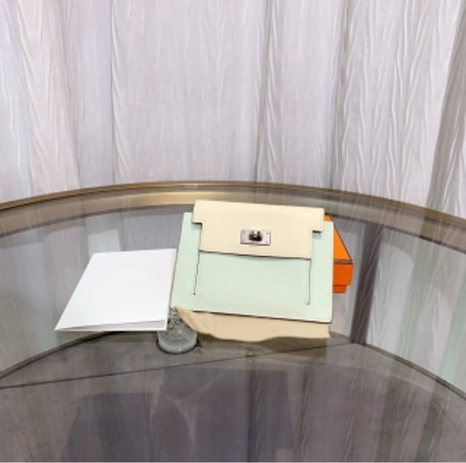 Hermes color-blocked Kelly Pocket coin purse, engraved with charm. US51281