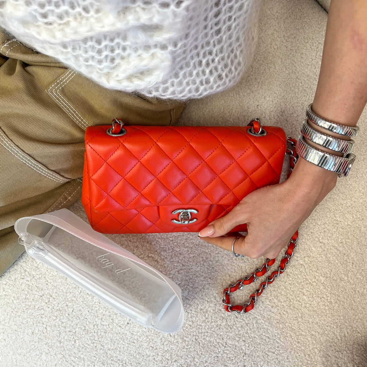 model wears BAG-D_TPU_insert_for_the_Chanel_Mini_Rectangle_front_view
