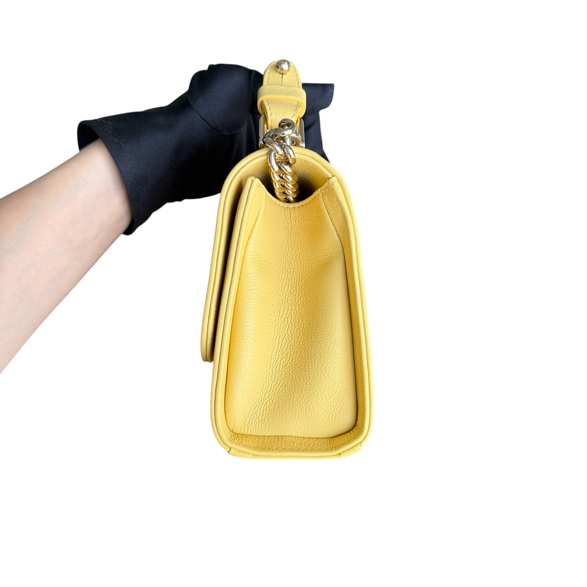 Luxury Evermore Chanel Label Click small quilted yellow grained calfskin bag side view with gold chain hardware