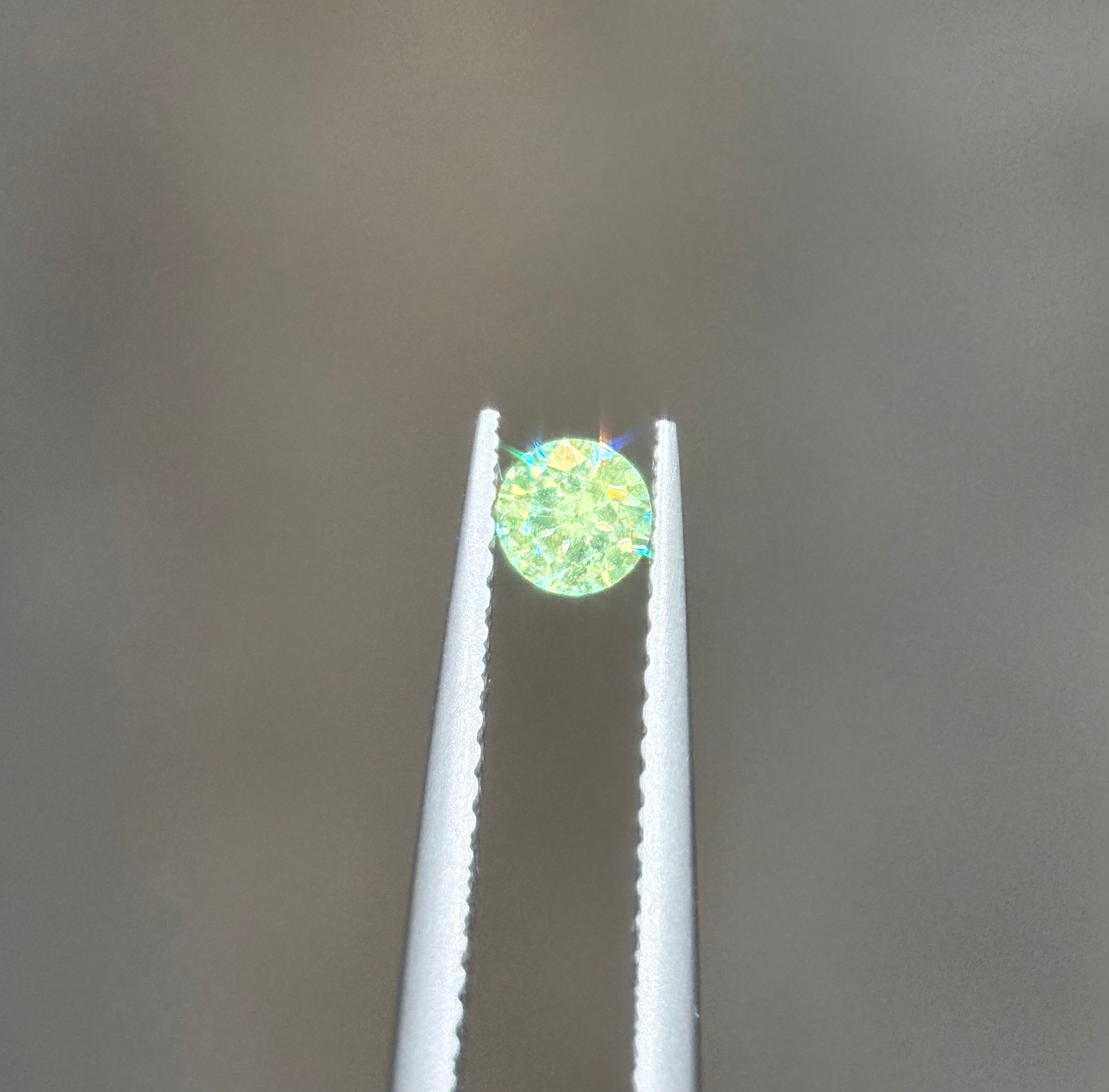 0.24ct Russian Demantoid with a horsetail DXBCS4836