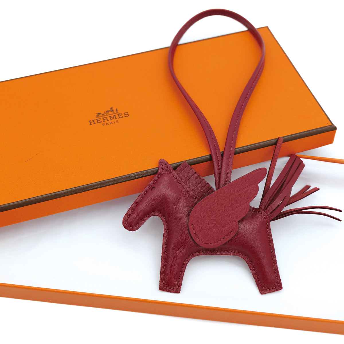 HERMES BAG CHARM RODEO PEGASUS PM ROUGE H AGNEAU MILO 2025 K STAMP 90313361
