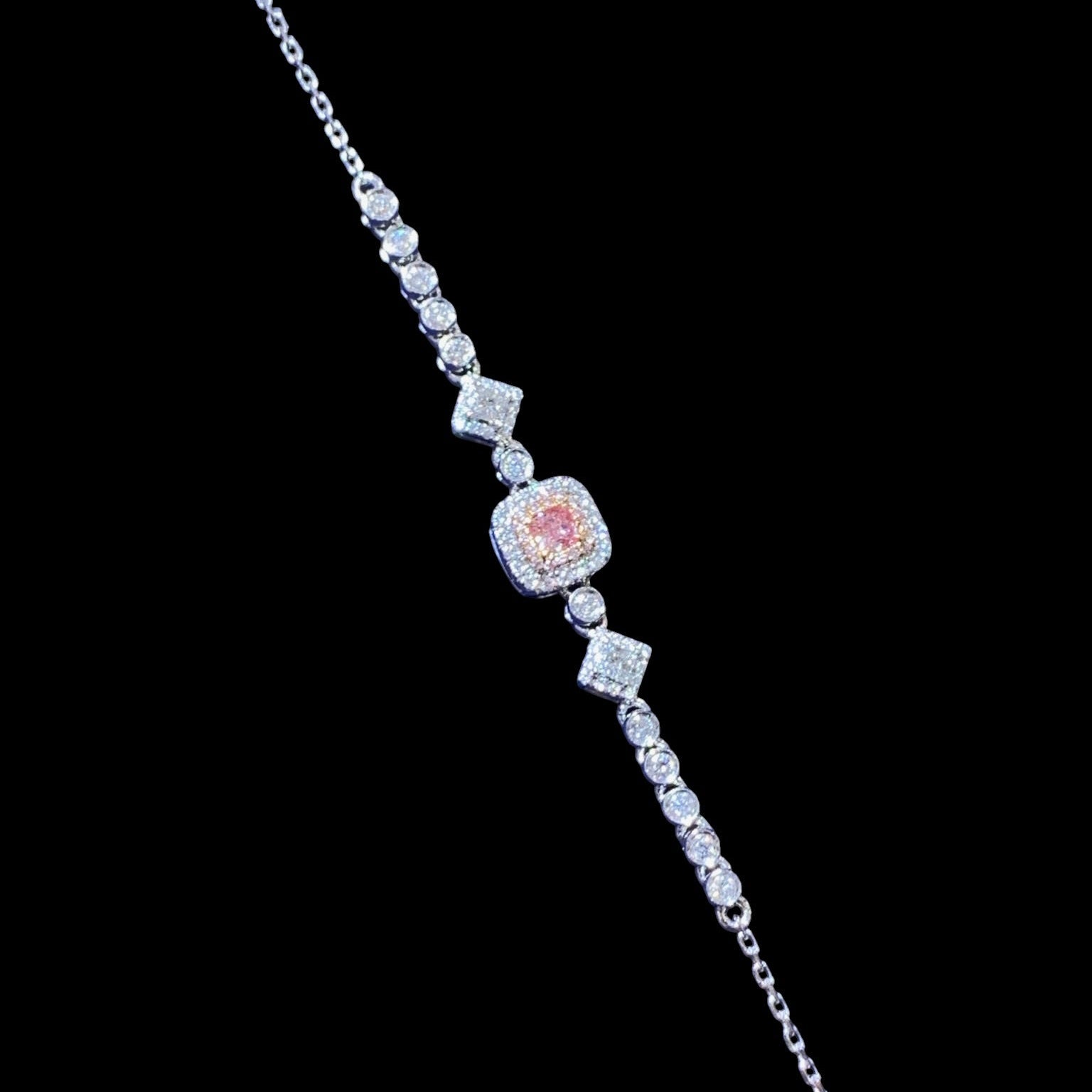 0.126ct Pink Centre Diamond with 0.421ct Surrounding White Diamond Bracelet set in 18K White Gold
