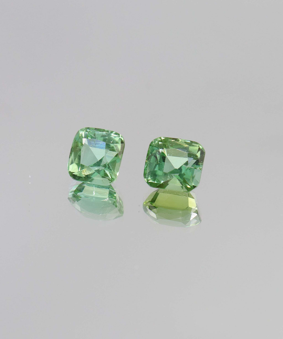 6.35ct Kunzite Green Cushion pair DXBCD2156