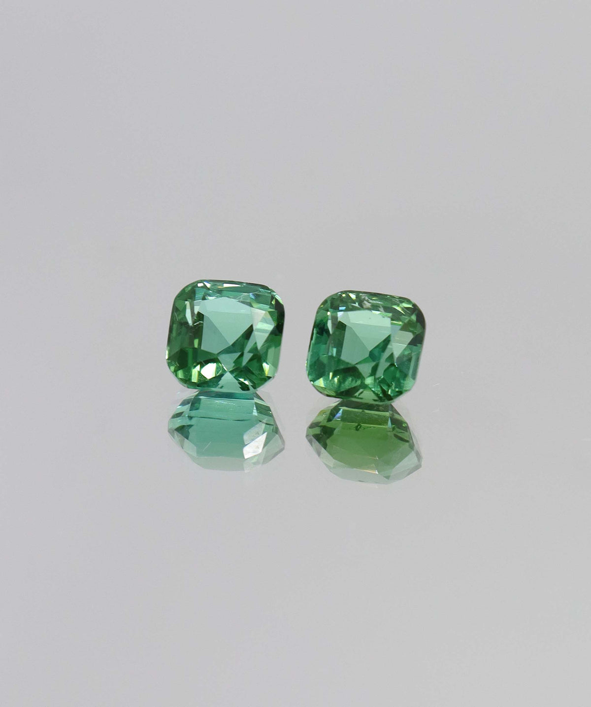 4.14ct Indigo Tourmaline cushion pair DXBCD2161