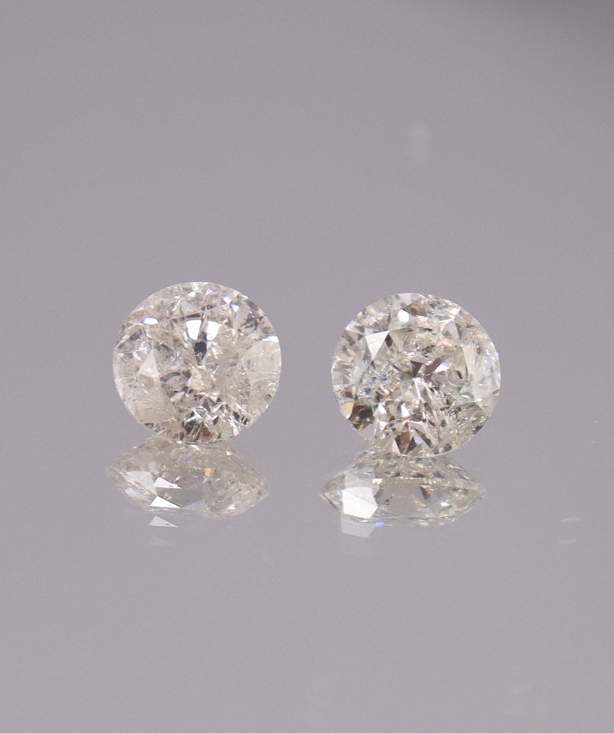 4.08CT D-G COMMERCIAL ROUND DIAMOND PAIR DXBS6723