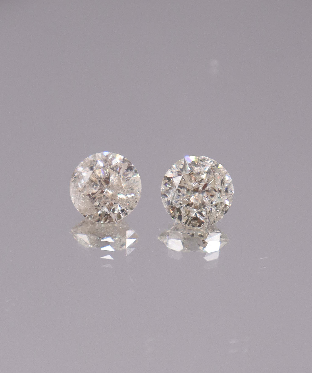 4.08CT D-G COMMERCIAL ROUND DIAMOND PAIR DXBS6723