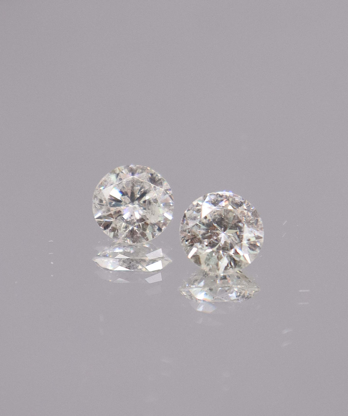 1.8CT D-G COMMERCIAL ROUND DIAMOND PAIR DXBS6681