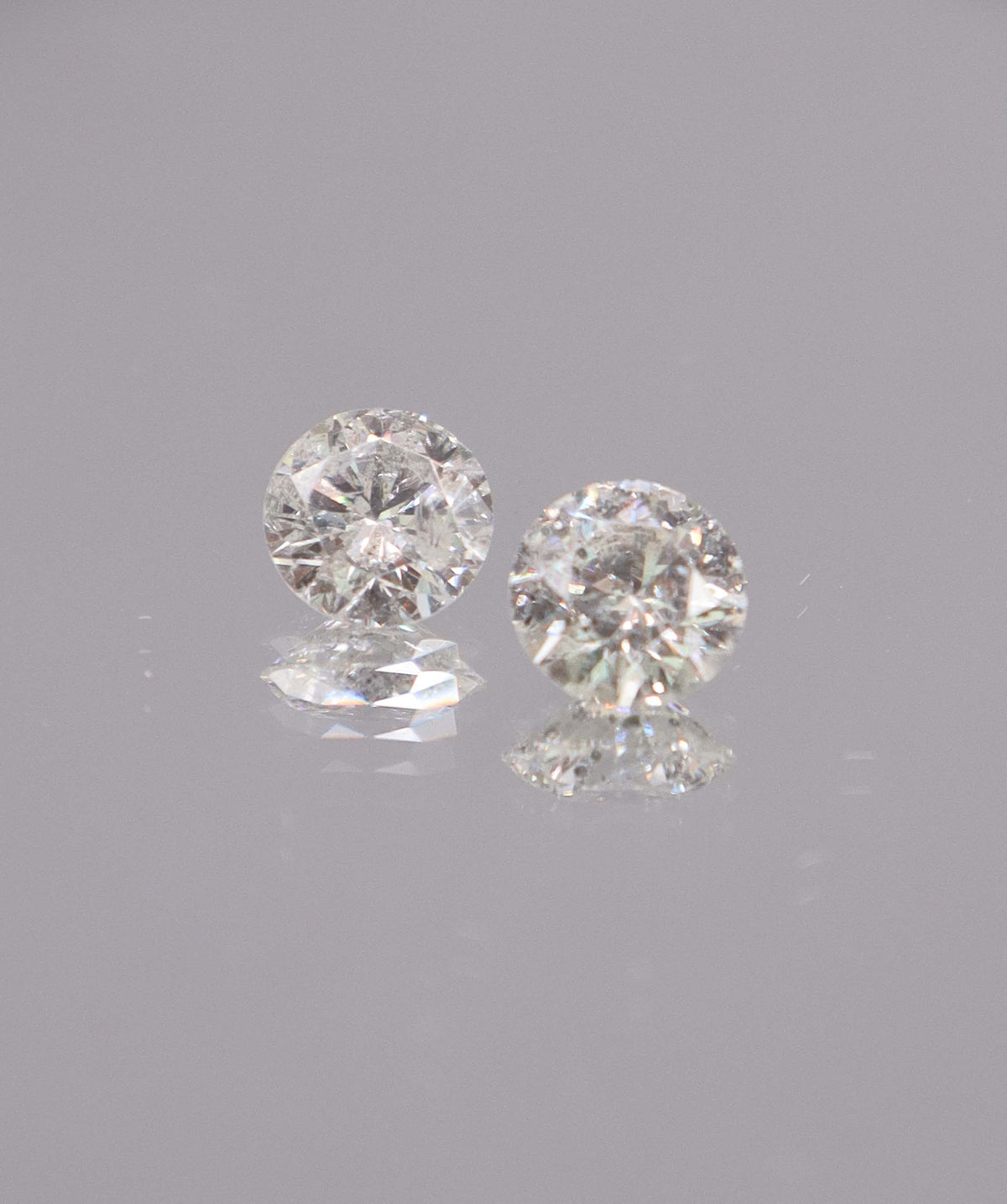 1.8CT D-G COMMERCIAL ROUND DIAMOND PAIR DXBS6681