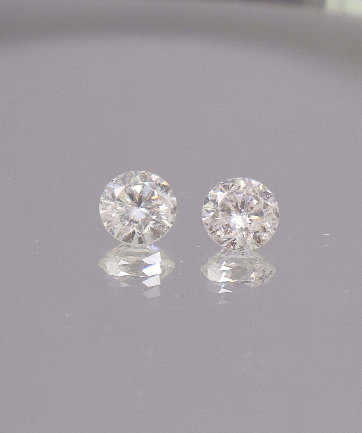 1.86CT D-G COMMERCIAL ROUND DIAMOND PAIR DXBS6674