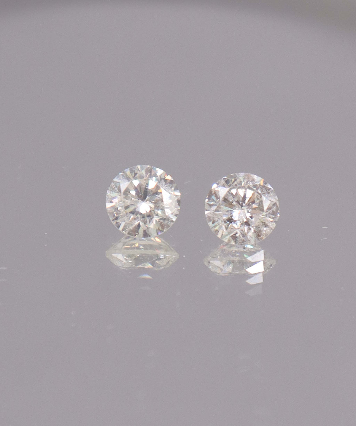 1.86CT D-G COMMERCIAL ROUND DIAMOND PAIR DXBS6674
