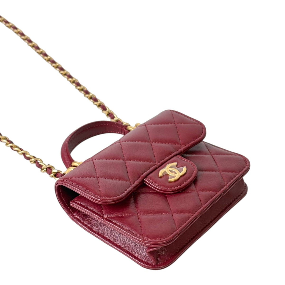 Chanel Quilted Lambskin Micro Handle Flap Bag