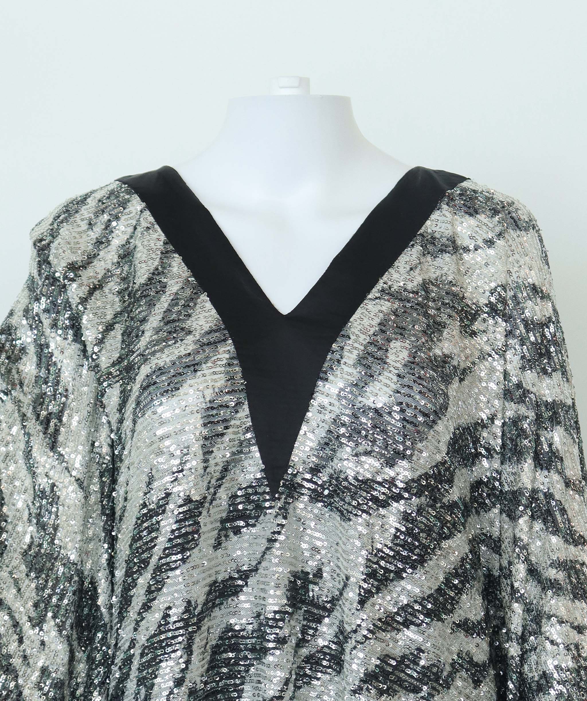 FAMOUS DRESS SIZE OS ASC7099