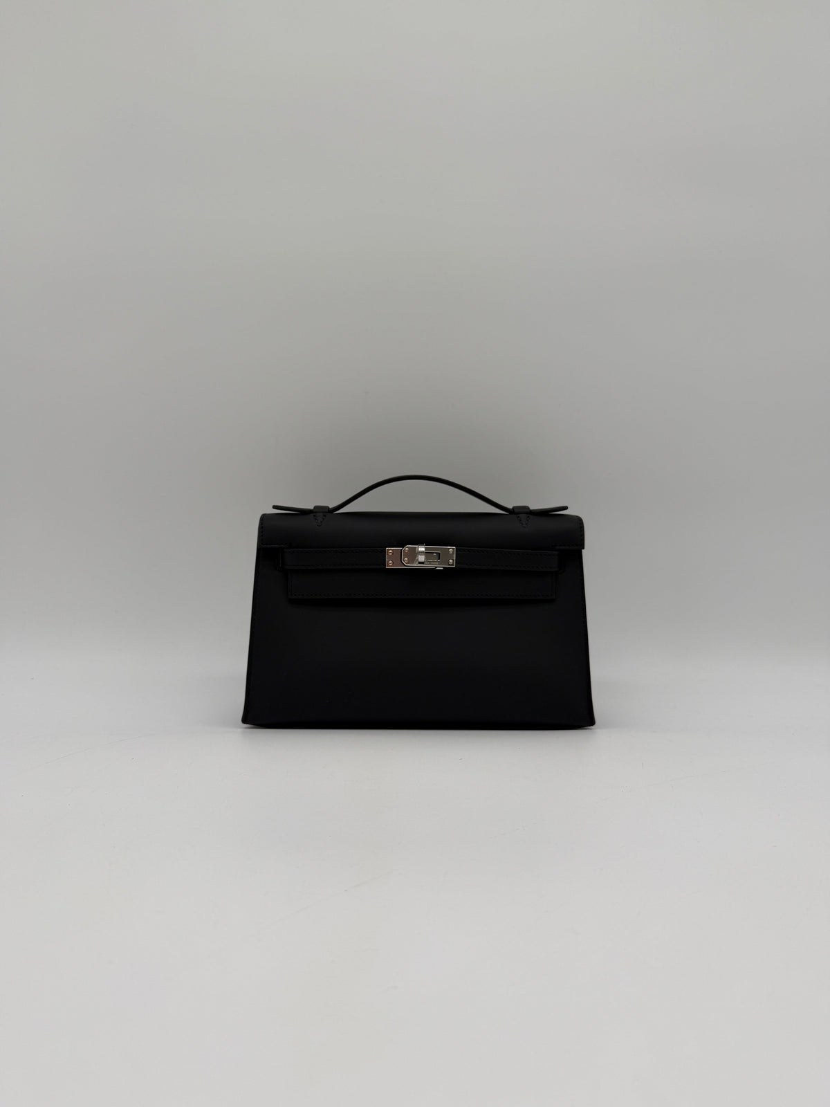 Hermès Kelly Pochette Black Swift Palladium Hardware