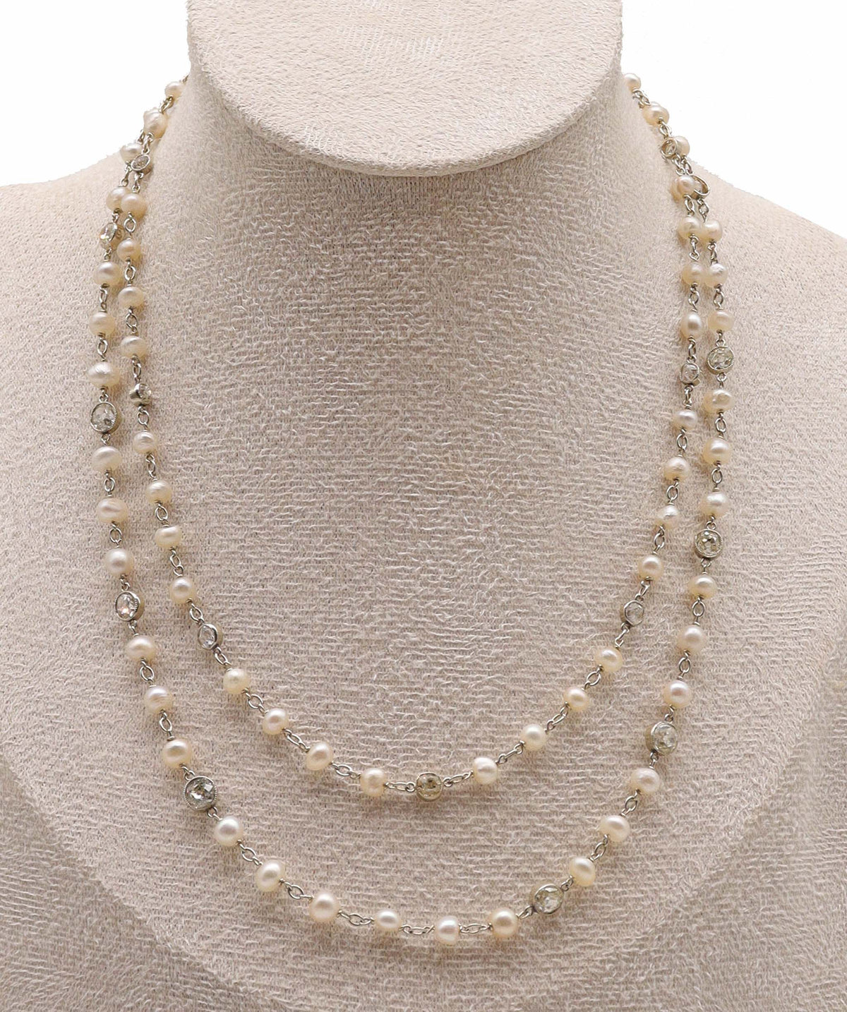 An Art Deco Pearl and Diamond Chain WA25672