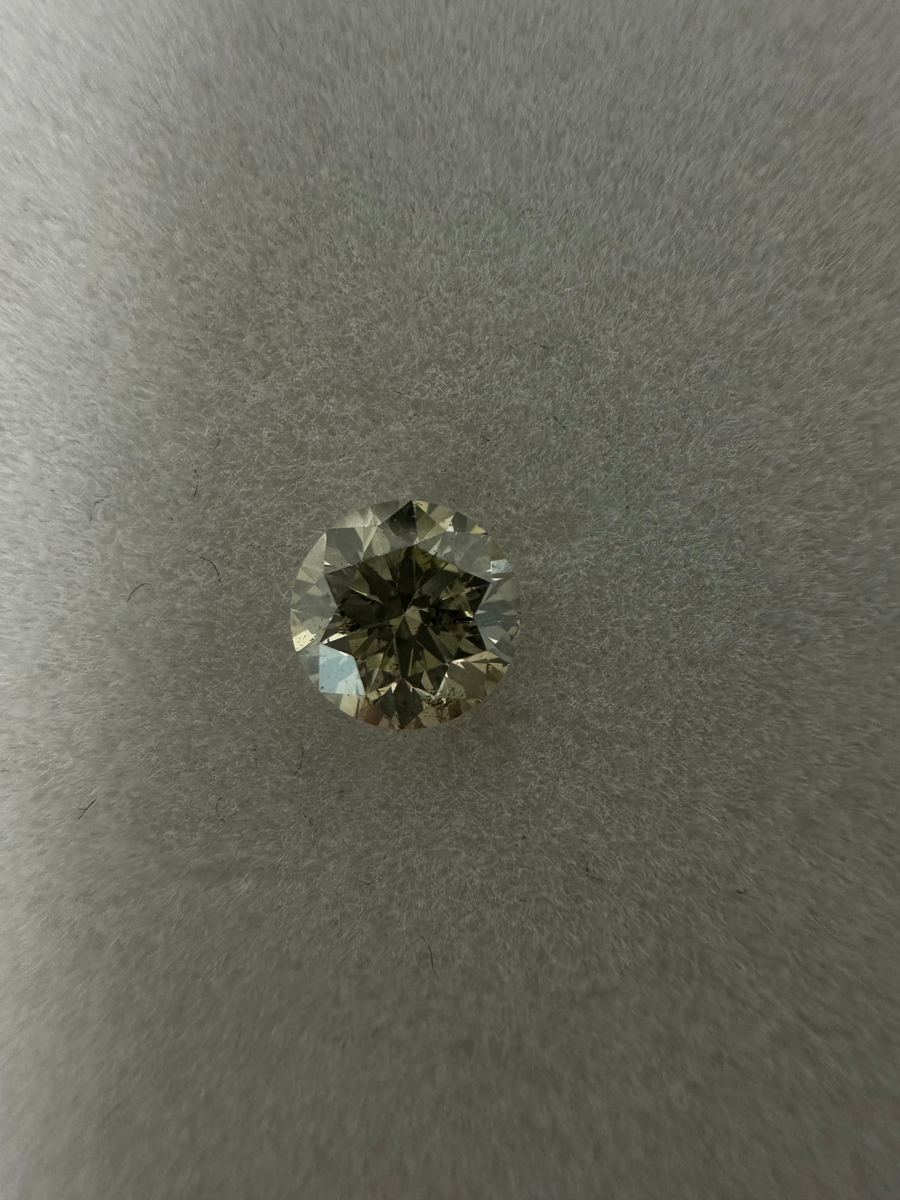 0.57ct LIGHT GREEN ROUND DIAMOND ANC1781