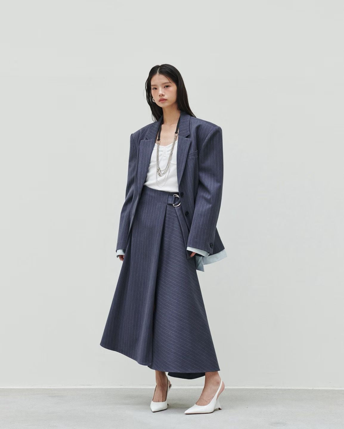 LOW RISE ASYMMETRIC MAXI SKIRT (تنورة) “YONG”