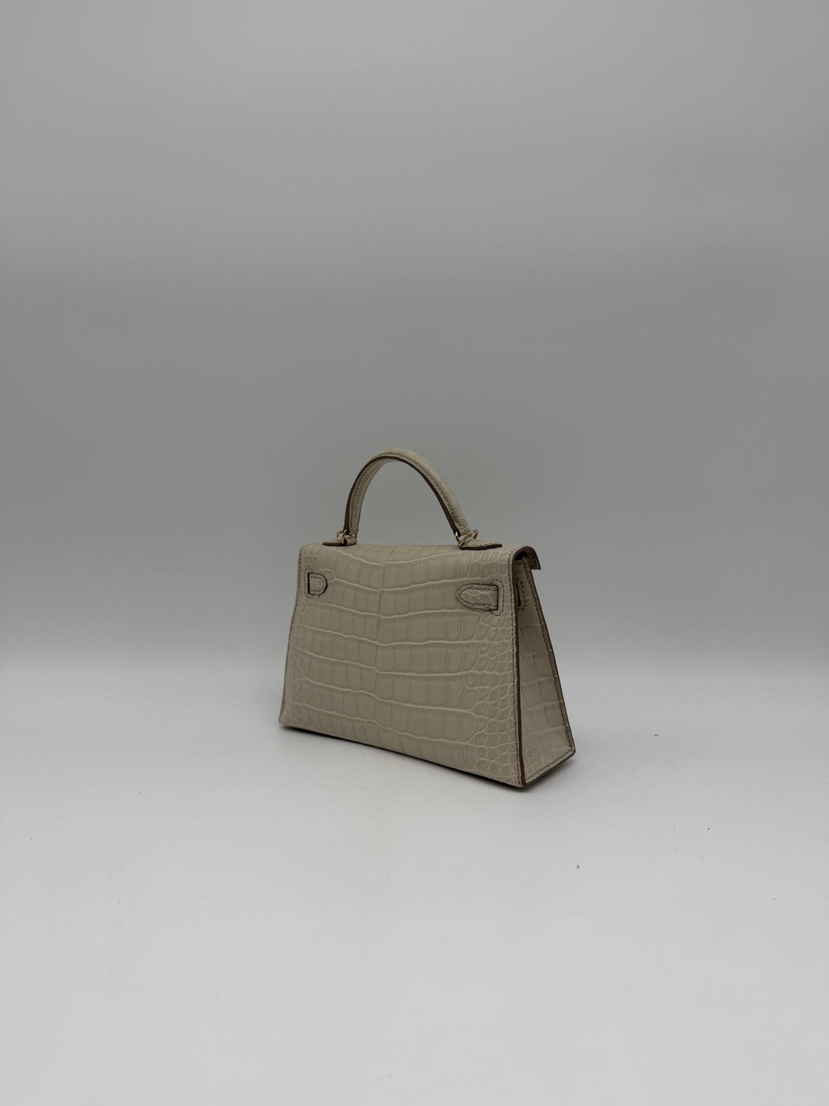 Hermès Mini Kelly Beton Matte Croc Permabrass Hardware