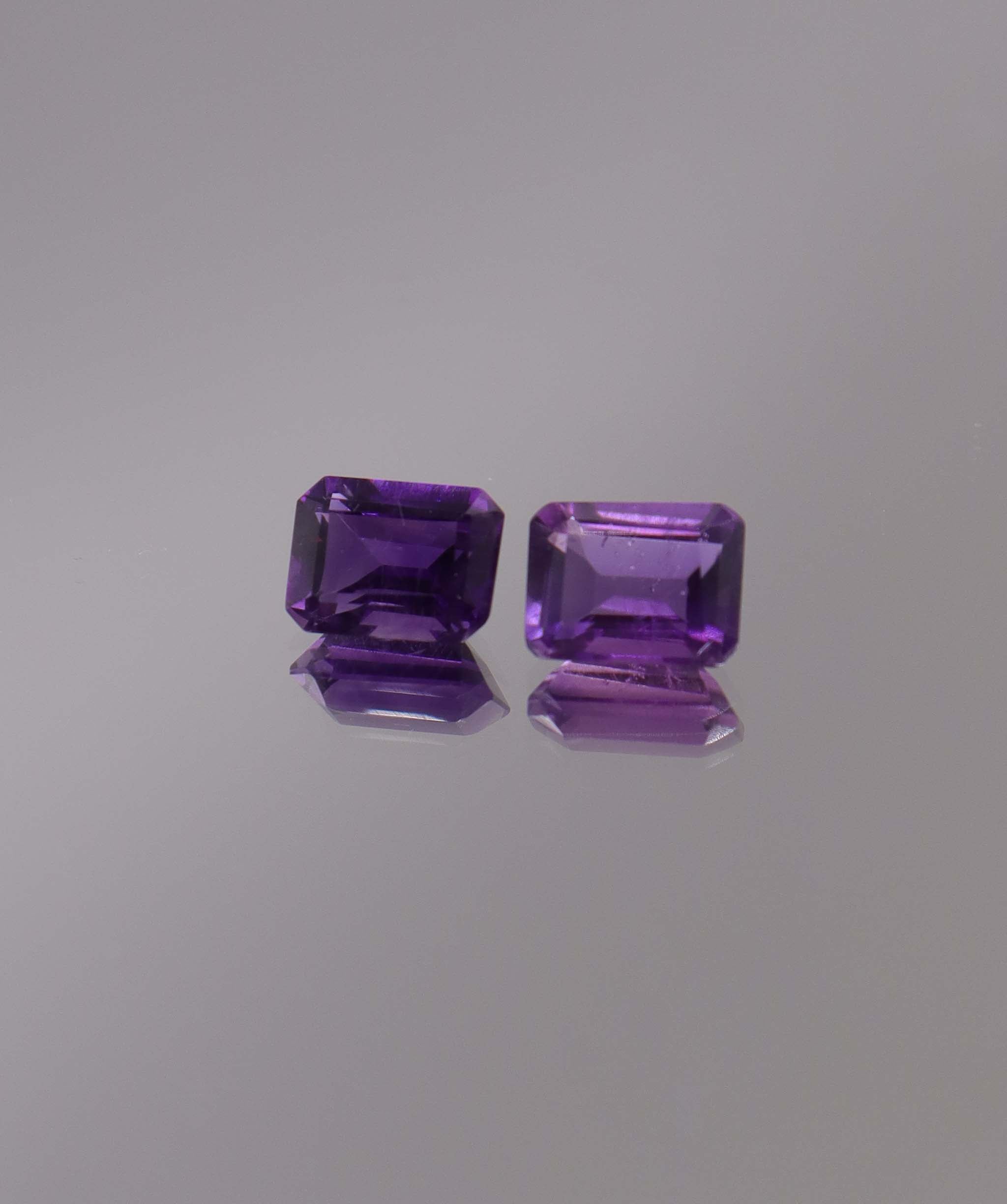 2.94ct Amethyst Emerald cut pair DXBCS1259