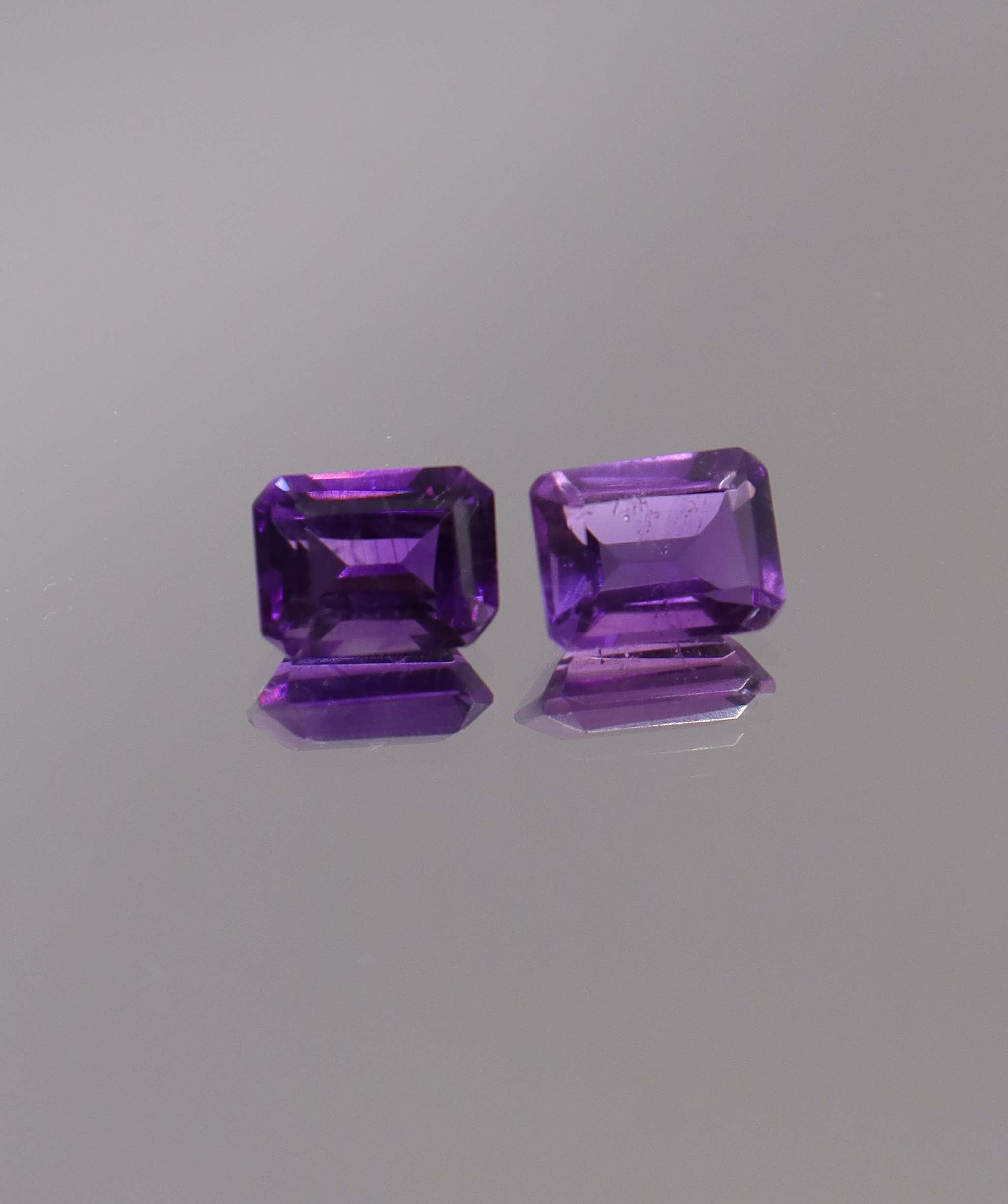 2.94ct Amethyst Emerald cut pair DXBCS1259