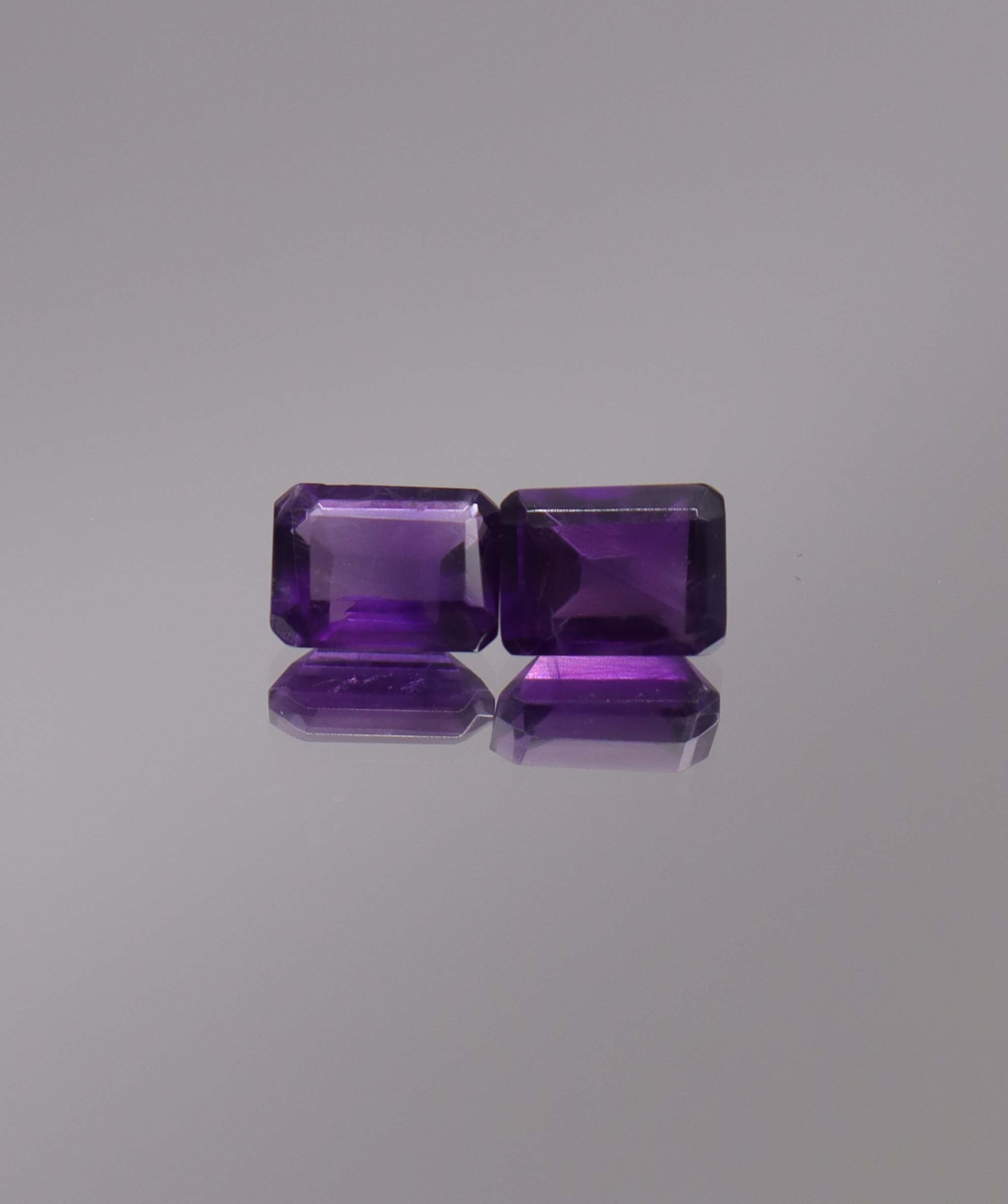 3.04ct Amethyst Emerald cut pair DXBCS1255