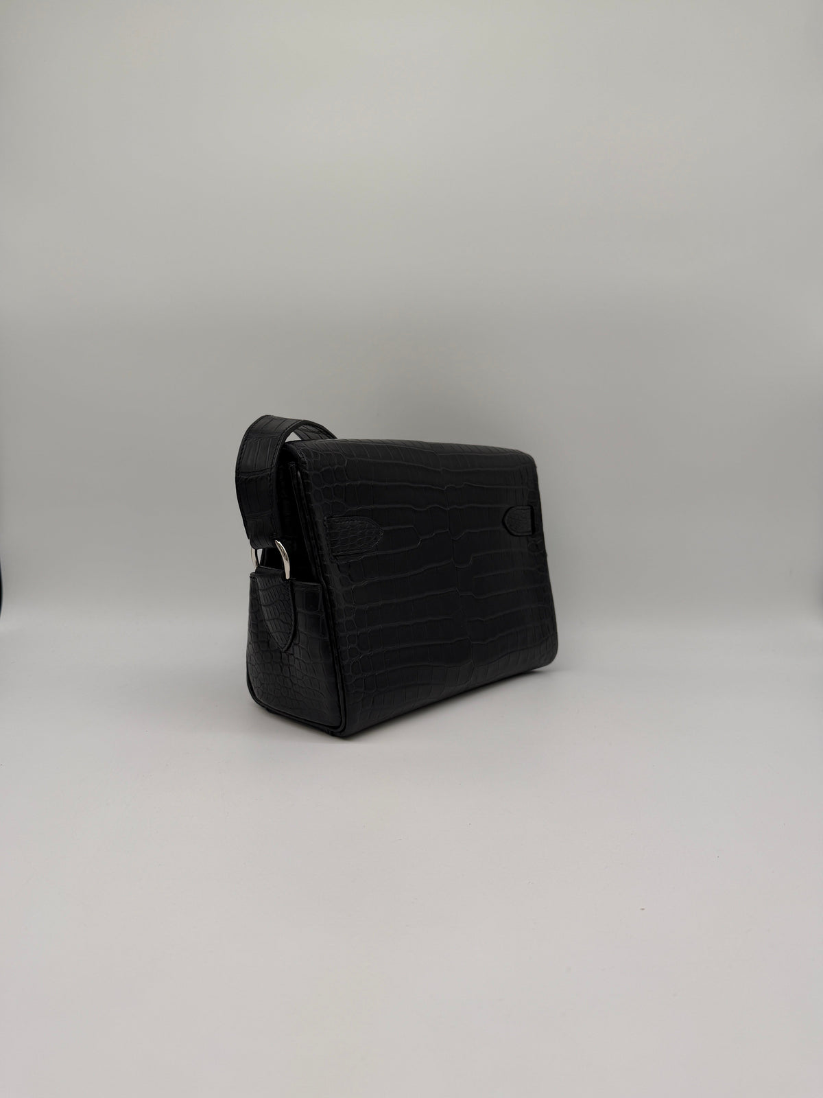 Hermès Kelly Messenger PM Black Matte Porosus Palladium Hardware