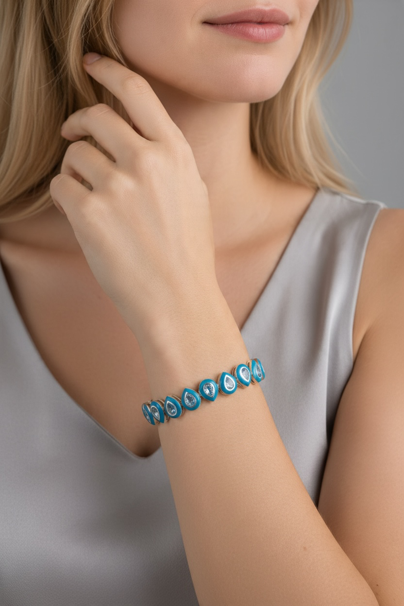 Dakry - 10crts Blue Topaz Pear Bracelet HOA010