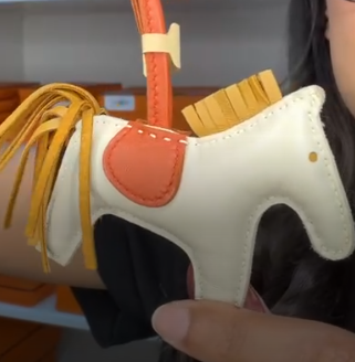 Hermes rodeo charm orange and cream ALC4238