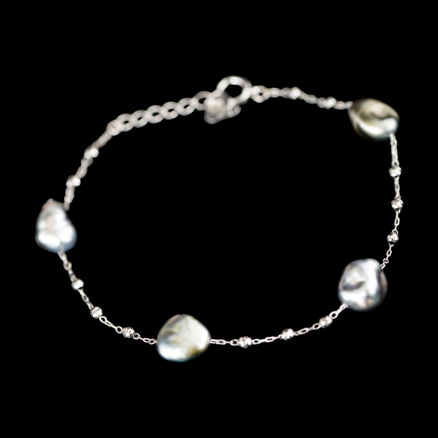 Natural Baroque Black Tahitian Pearl Bracelet set in 18k White Gold