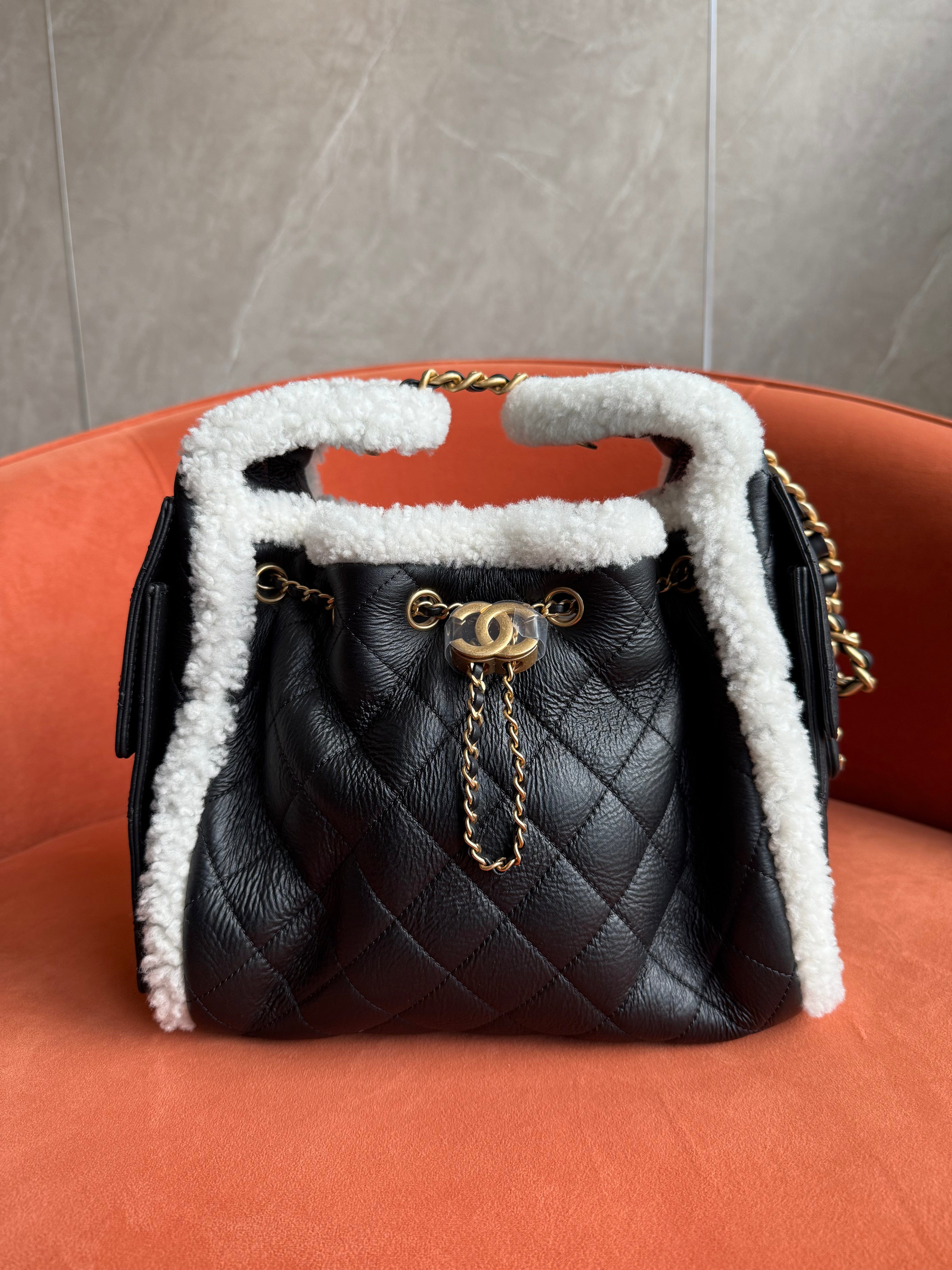 Aureon Group Limited *LONDON LOCATED* CHANEL 25 SMALL HANDBAG BLACK & WHITE Crumpled Shearling Sheepskin with Gold Tone Metal