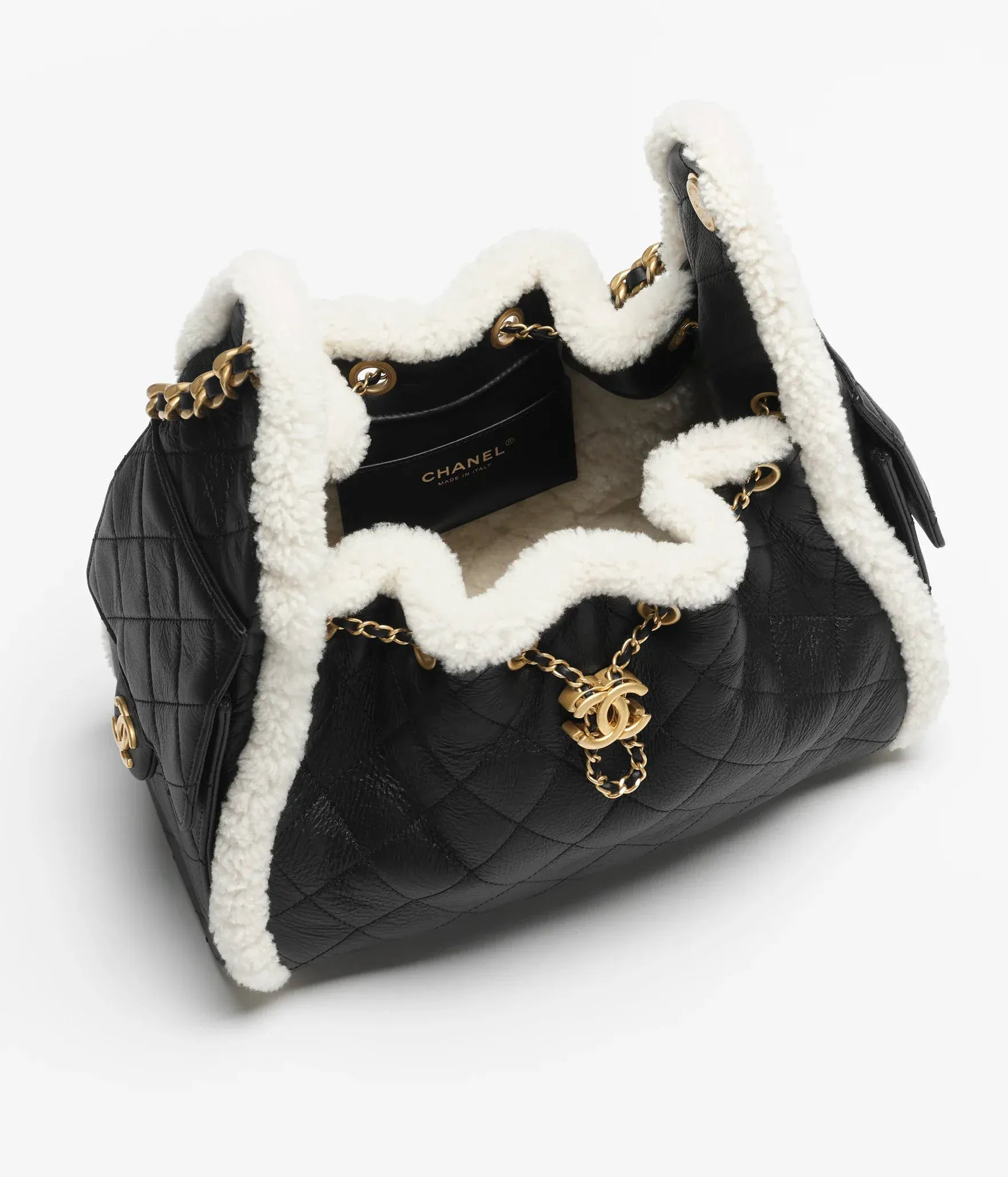 Aureon Group Limited *LONDON LOCATED* CHANEL 25 SMALL HANDBAG BLACK & WHITE Crumpled Shearling Sheepskin with Gold Tone Metal