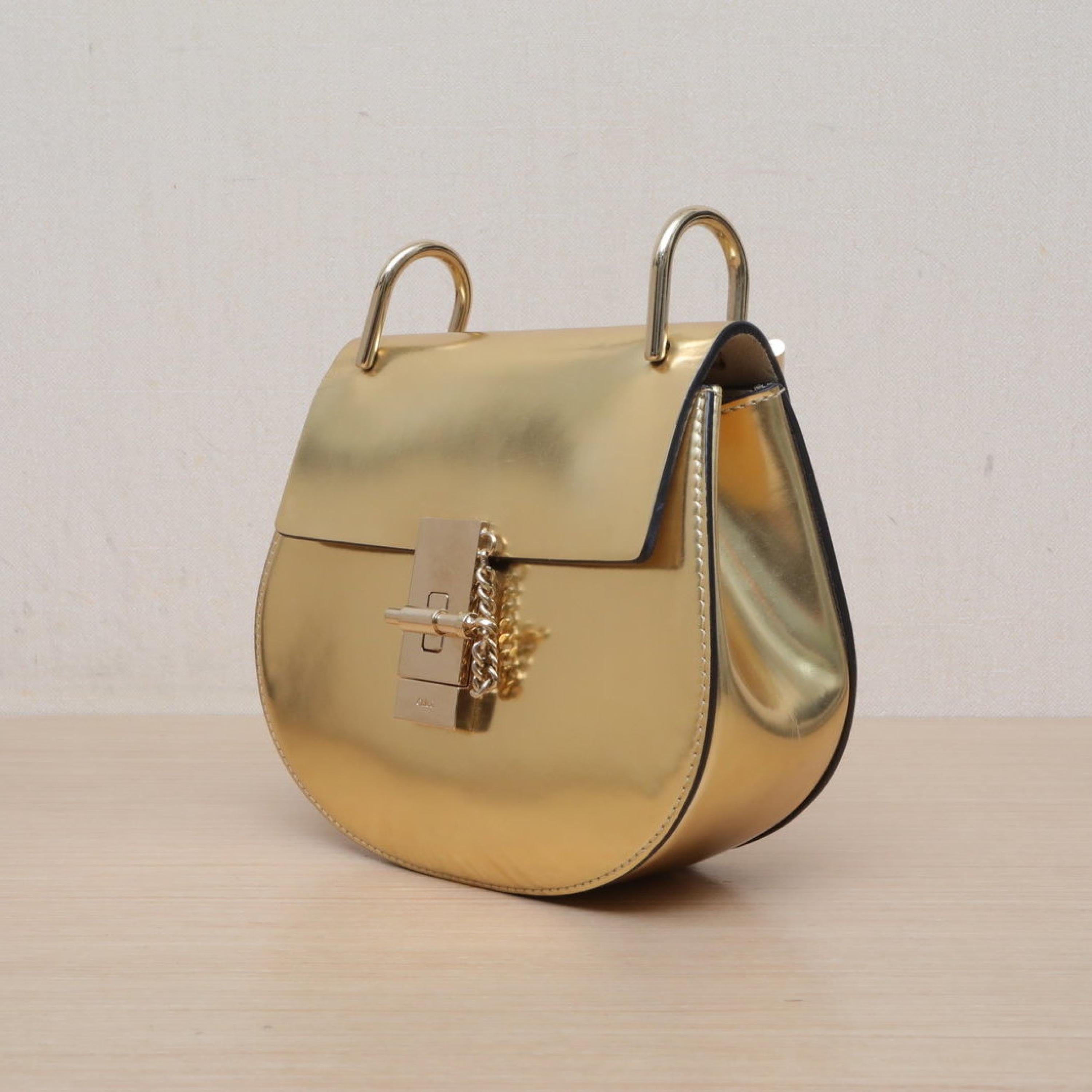 Chloé Chloe Drew Piggy Bank Small Gold Leather C
No accessories ALC3152