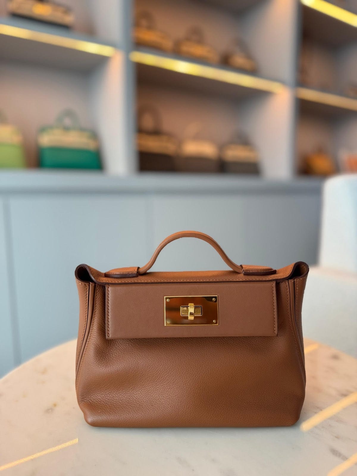Hermès 24/24 21 Gold Evercolor with Gold Hardware AGC3238