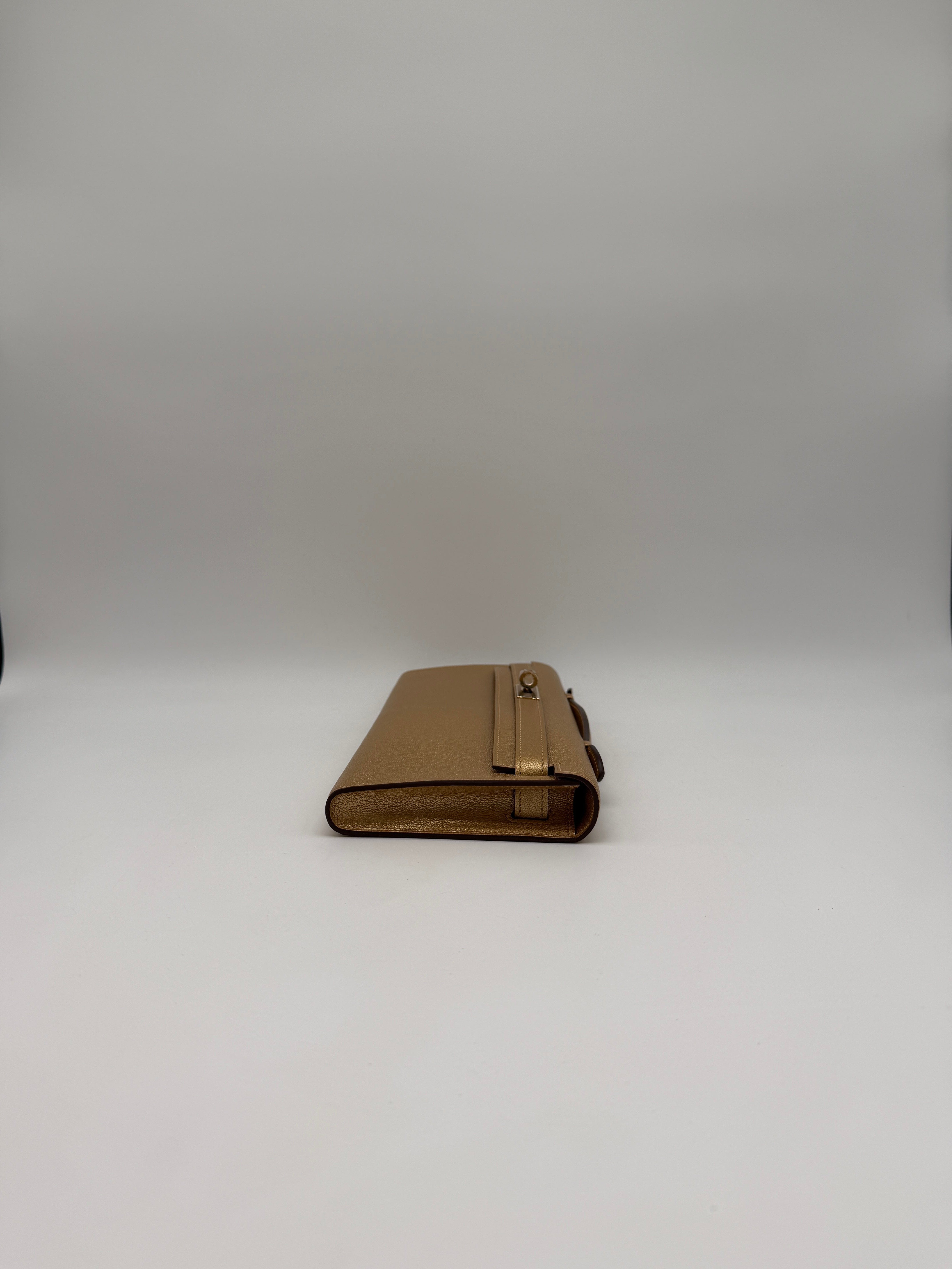 Hermès Hermès Kelly Cut Chamkilight Dore Chevre Permabrass Hardware