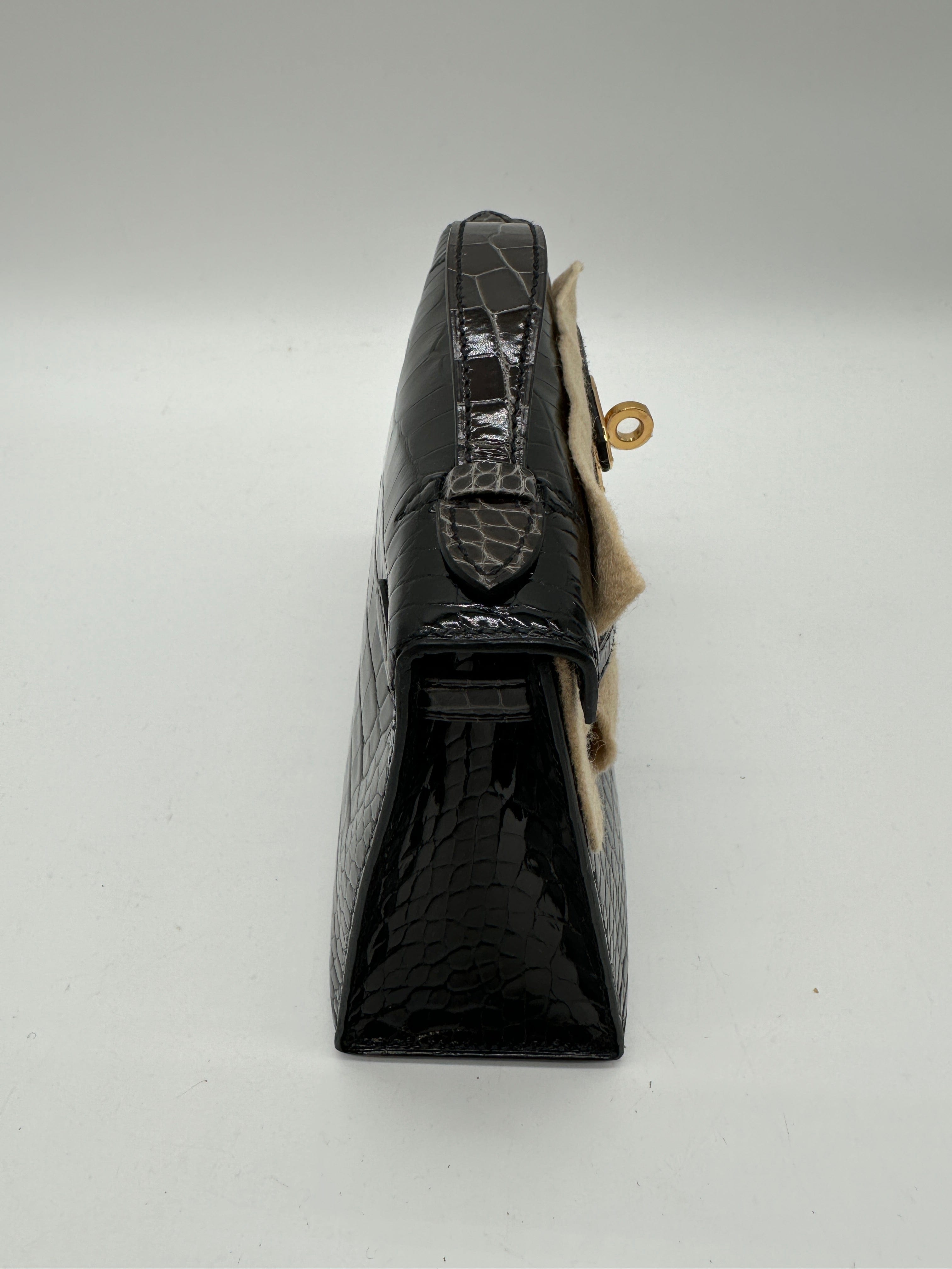 Hermès Hermès Kelly Pochette HSS black / graphite shiny alligator GHW W 2025 PC525