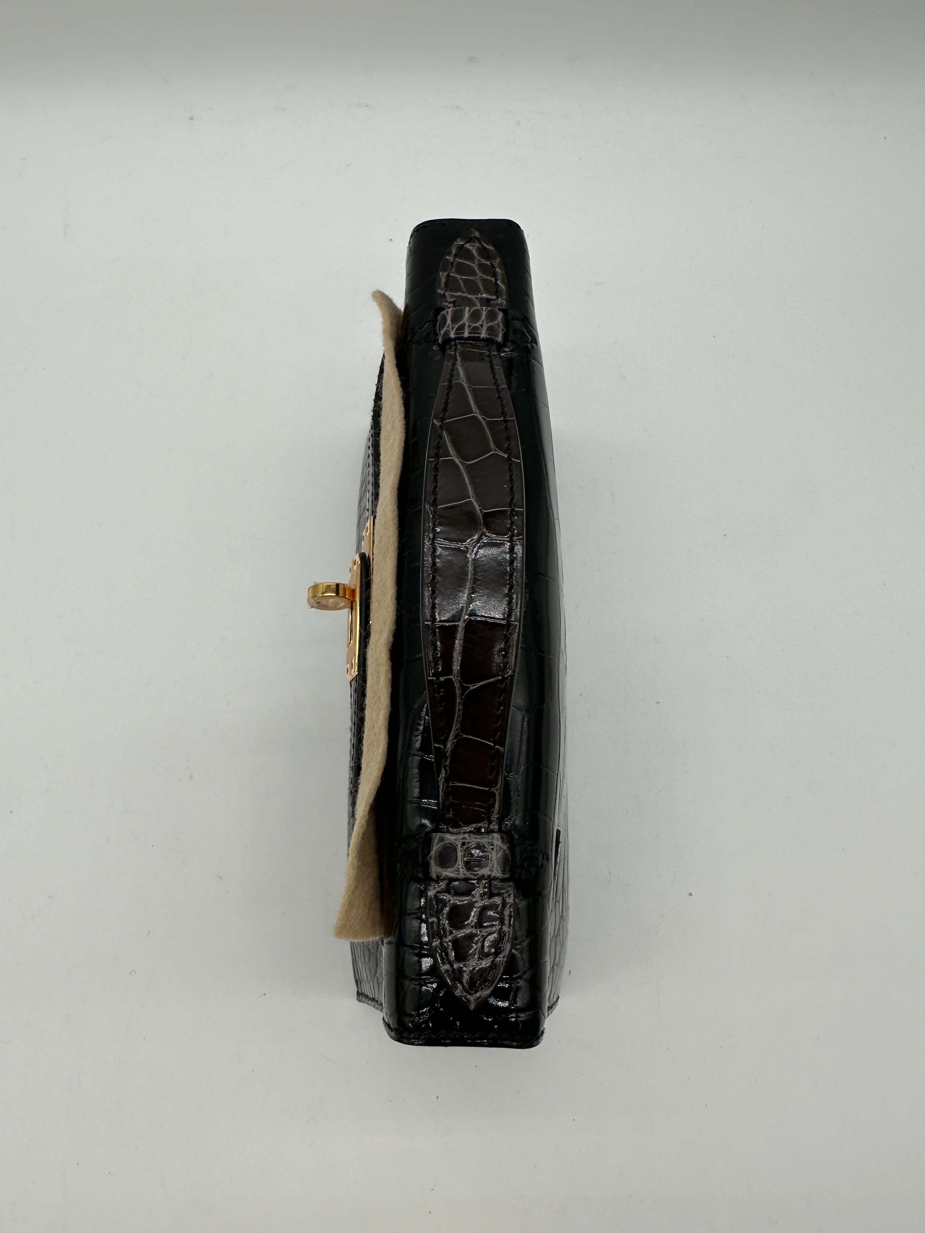 Hermès Hermès Kelly Pochette HSS black / graphite shiny alligator GHW W 2025 PC525