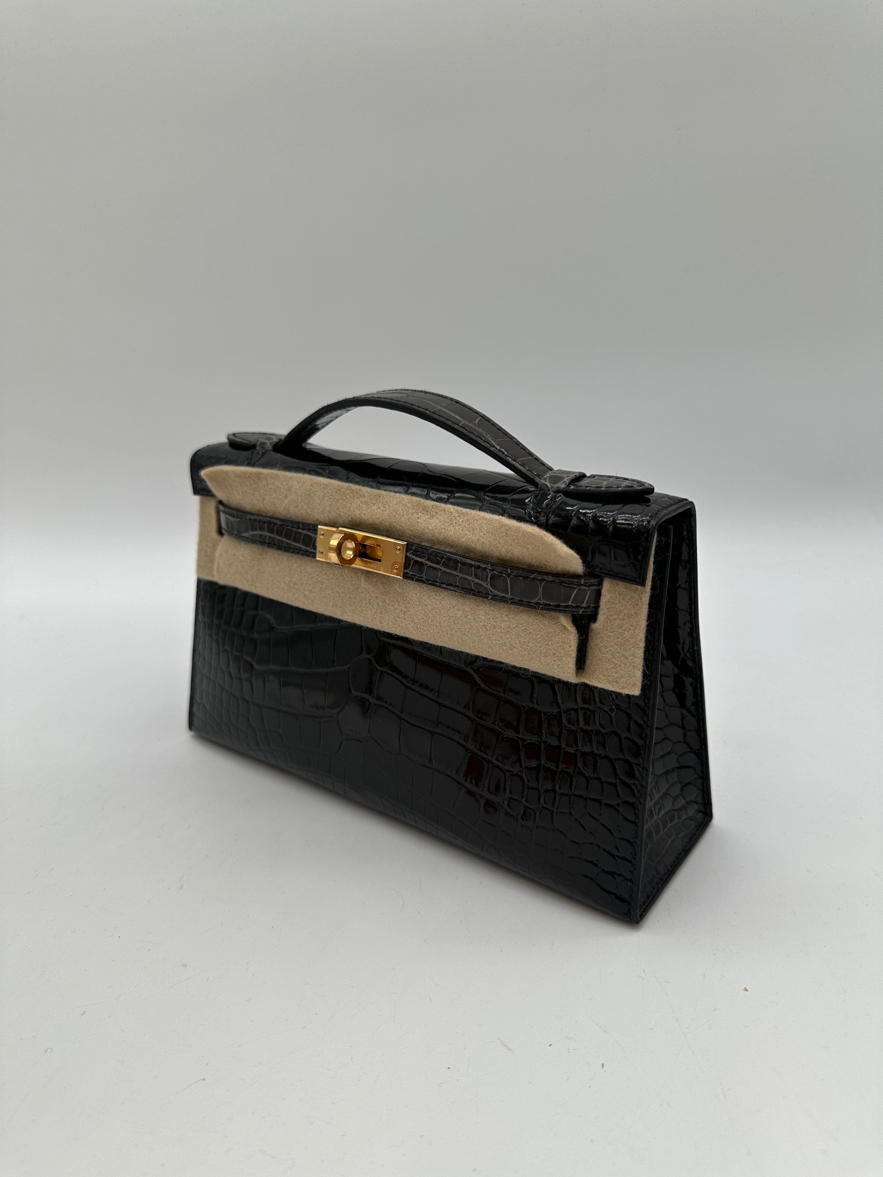 Hermès Hermès Kelly Pochette HSS black / graphite shiny alligator GHW W 2025 PC525