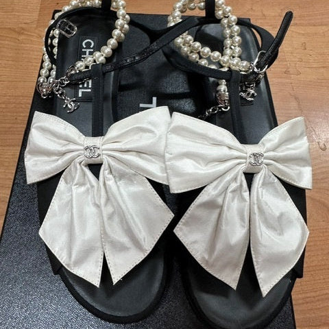 111A. Chanel Black Sandal with Pearl Ankle Strap and White Satin Bows - Size 38