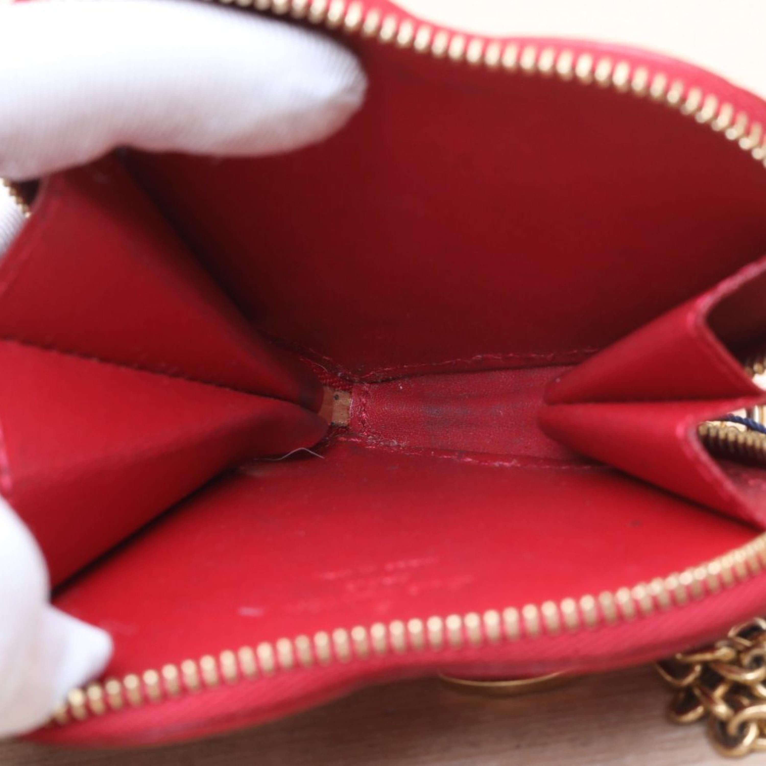 Louis Vuitton Louis Vuitton Red Patent Leather Heart Coin Purse
No accessories ALC3162