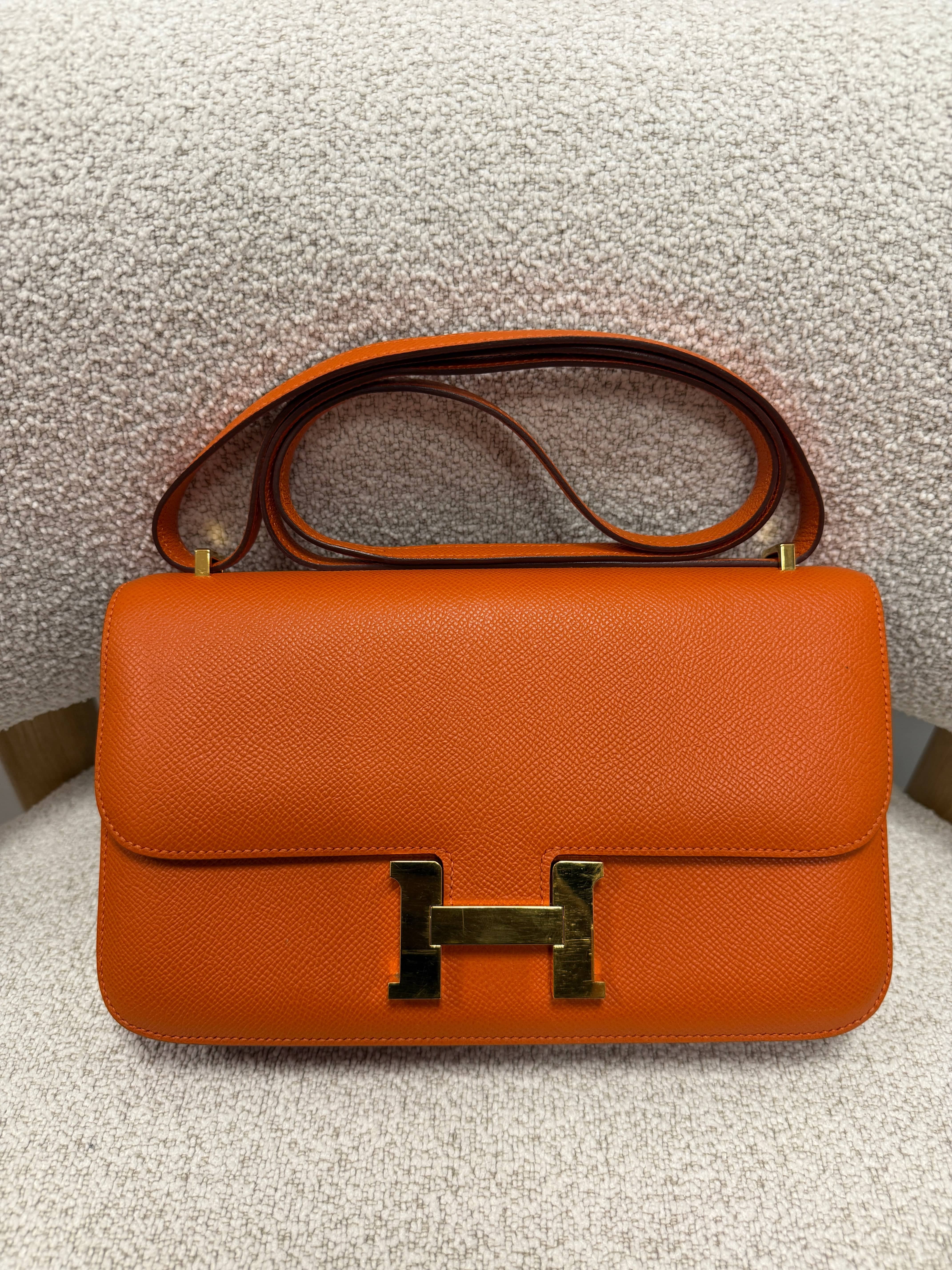 LUXURY PROMISE PRELOVED HERMÈS CONSTANCE ELAN ORANGE Epsom Leather with Gold Hardware