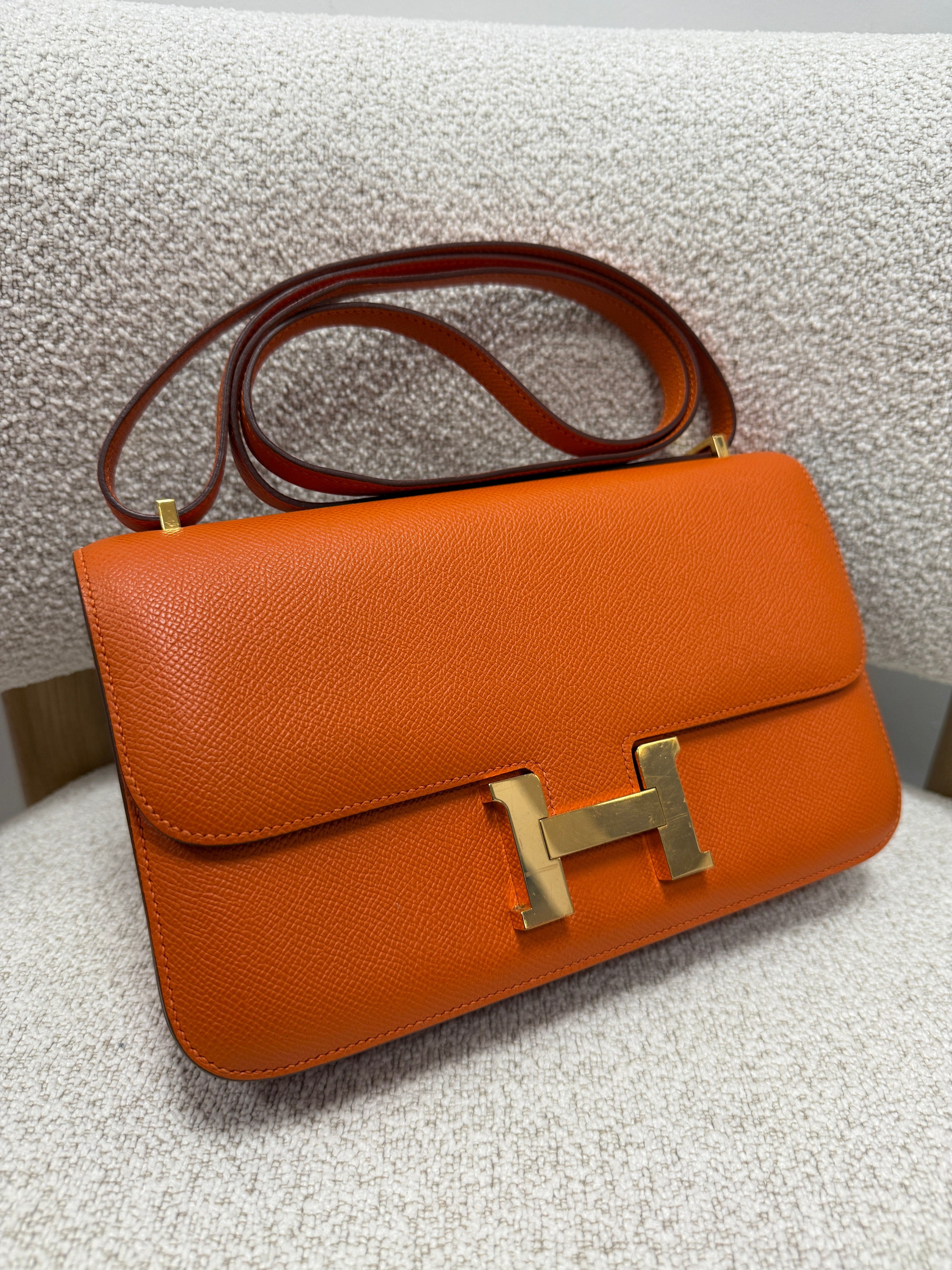 LUXURY PROMISE PRELOVED HERMÈS CONSTANCE ELAN ORANGE Epsom Leather with Gold Hardware