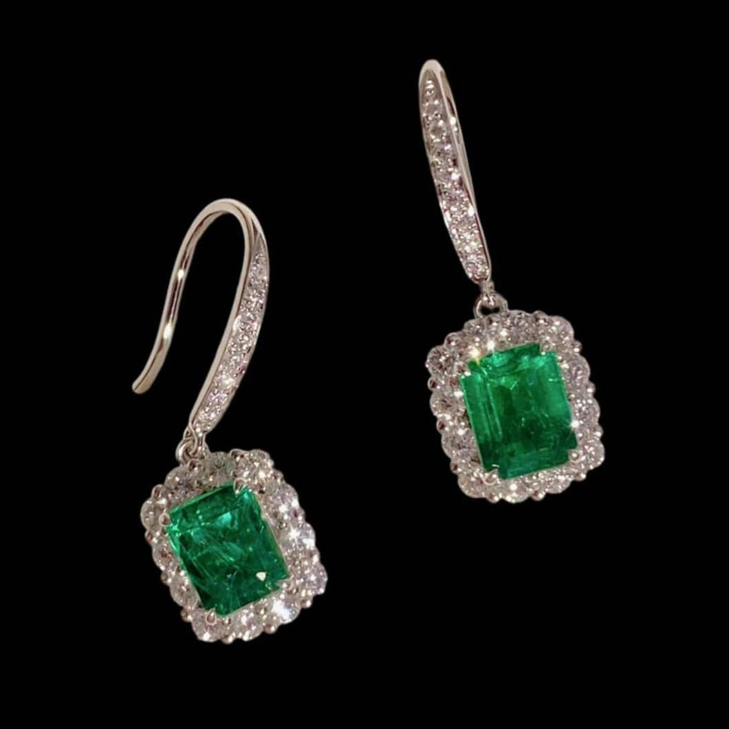 Luxury Promise 1.57ct Emerald & 0.69ct Diamond Earrings set in 18K White Gold