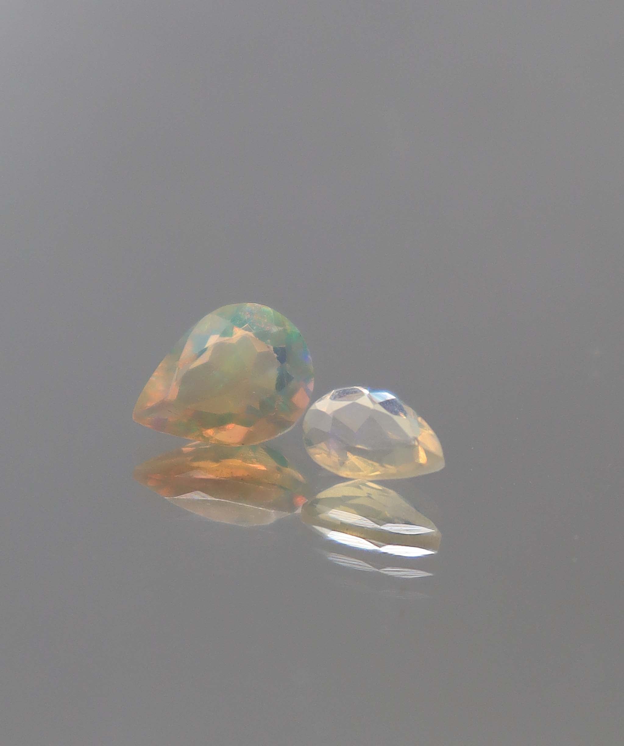 Luxury Promise 0.87ct Opal Pear pair DXBCS2293