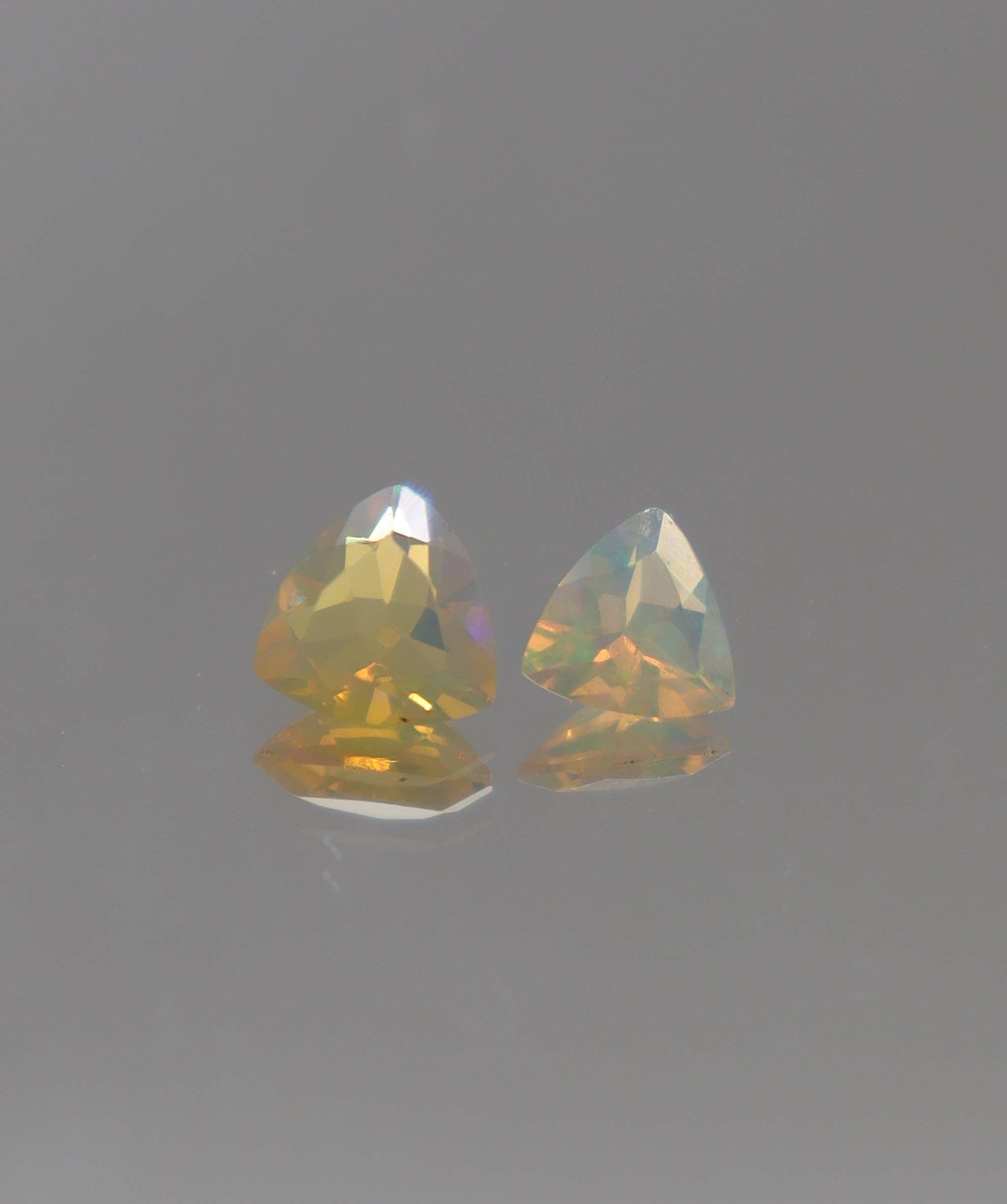 Luxury Promise 0.93ct Opal Trillion pair DXBCS2292