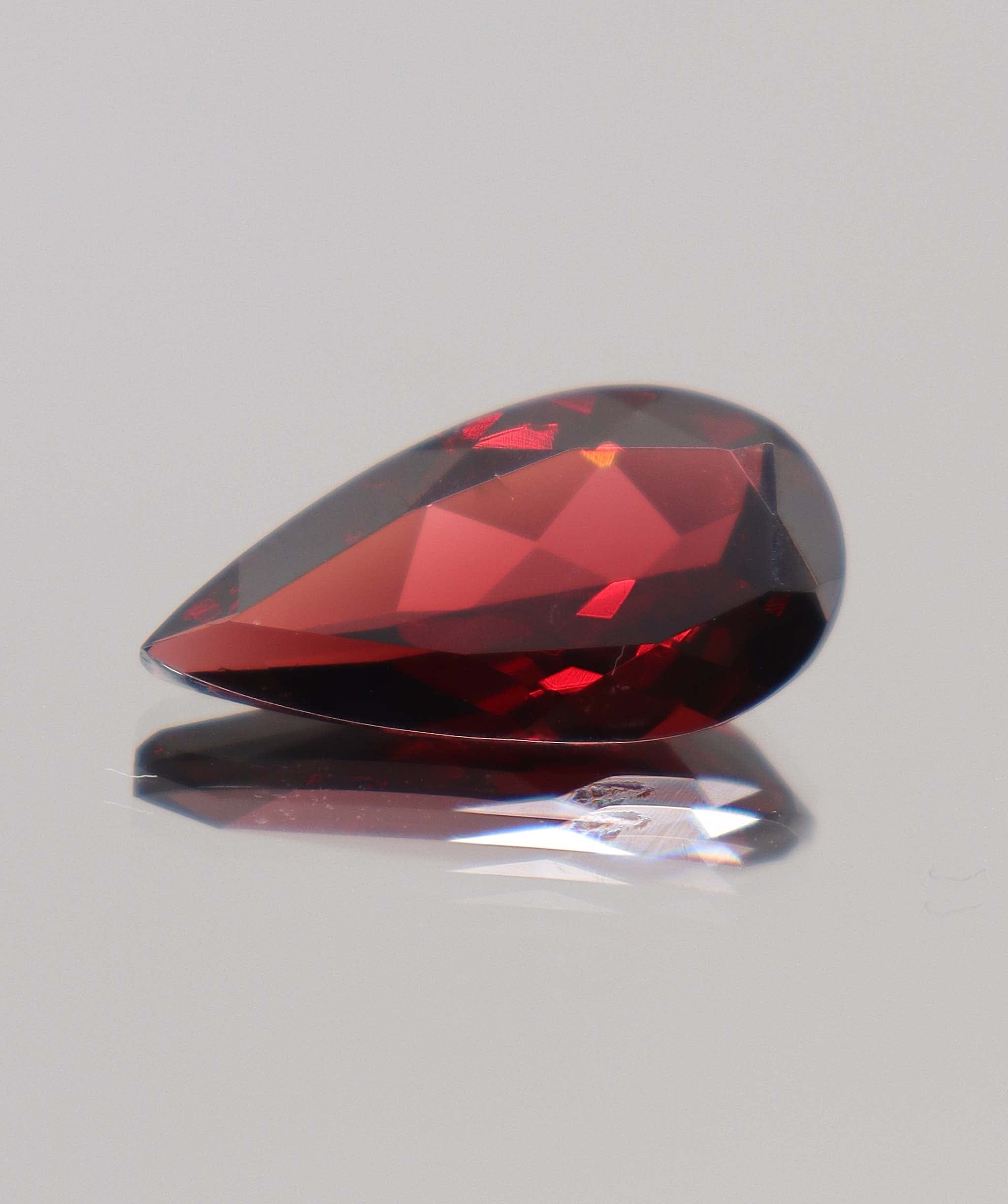 Luxury Promise 10.15ct Almandine Pear DXBCS0408