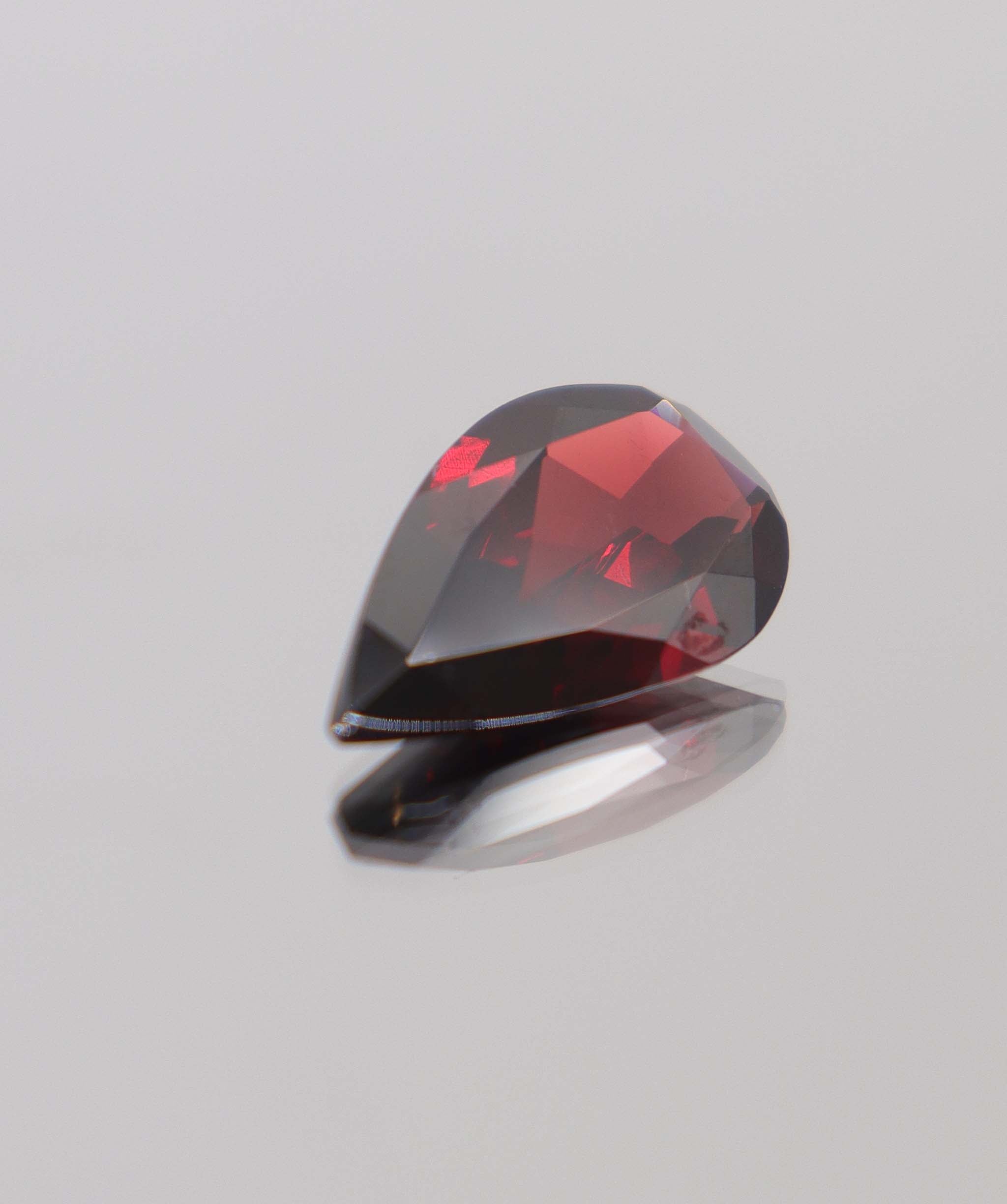 Luxury Promise 10.15ct Almandine Pear DXBCS0408