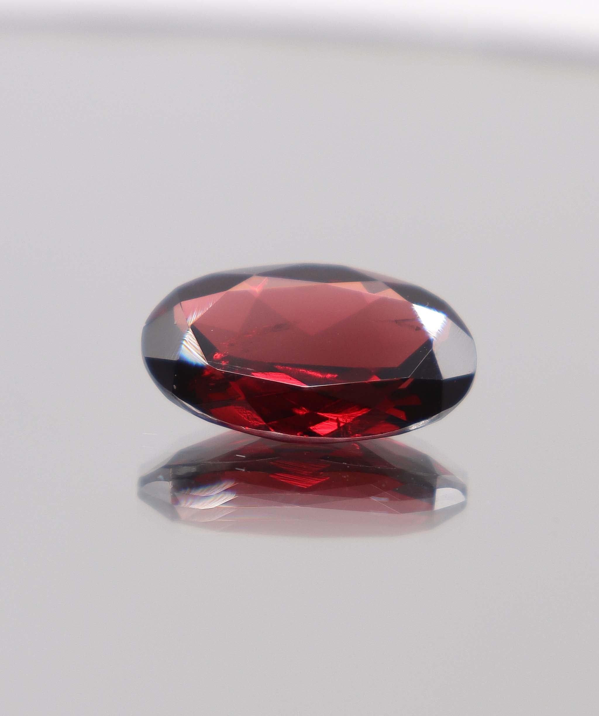 Luxury Promise 11.11ct Almandine Oval DXBCS0398